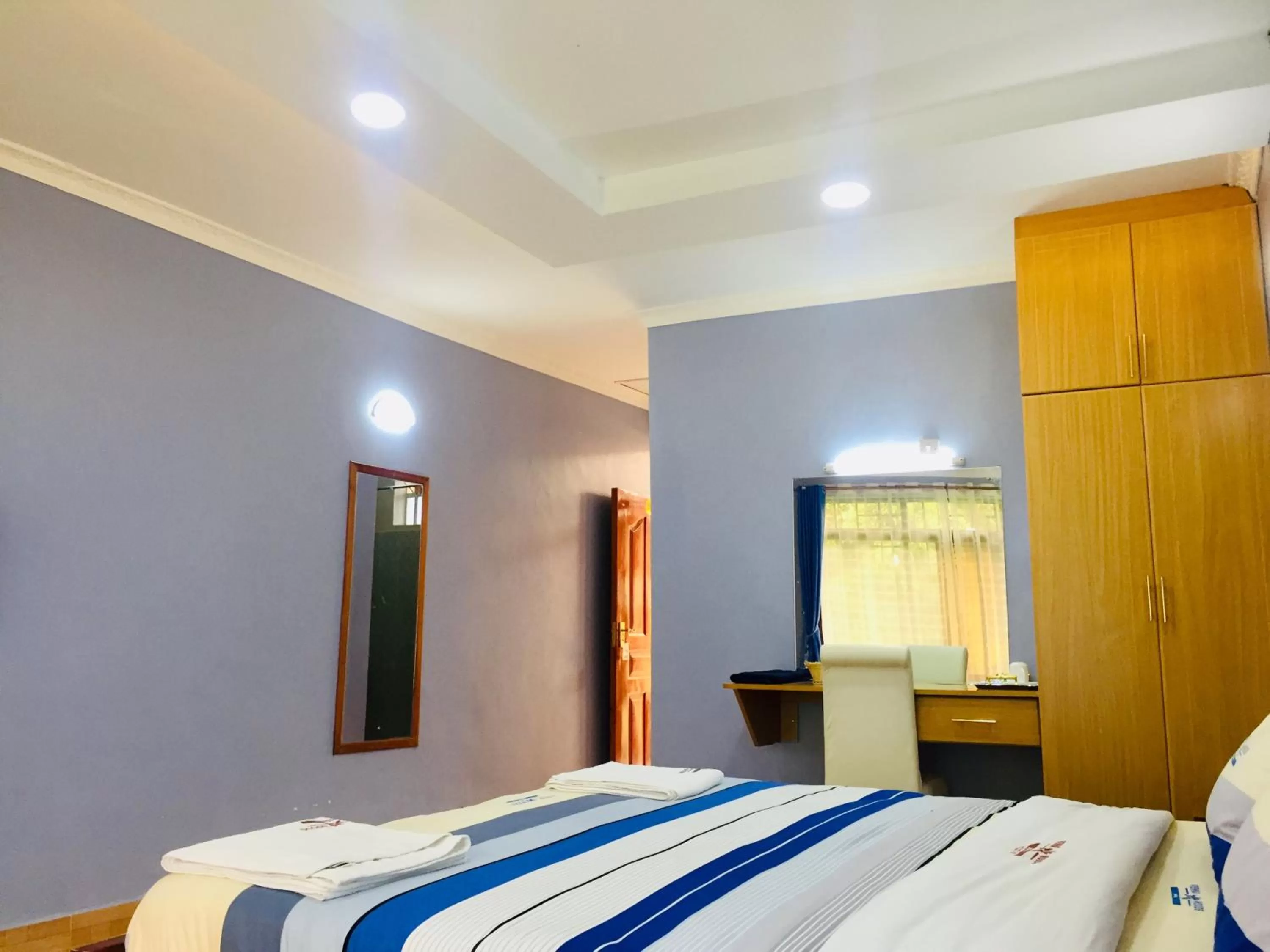 Bed in Vienna Woods Hotel Nakuru