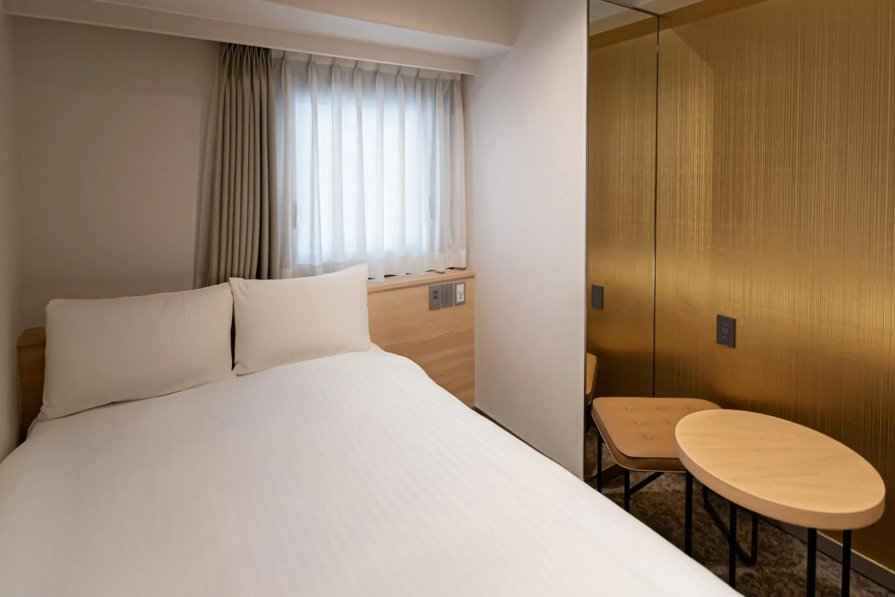 Photo of the whole room, Bed in EN HOTEL Hakata