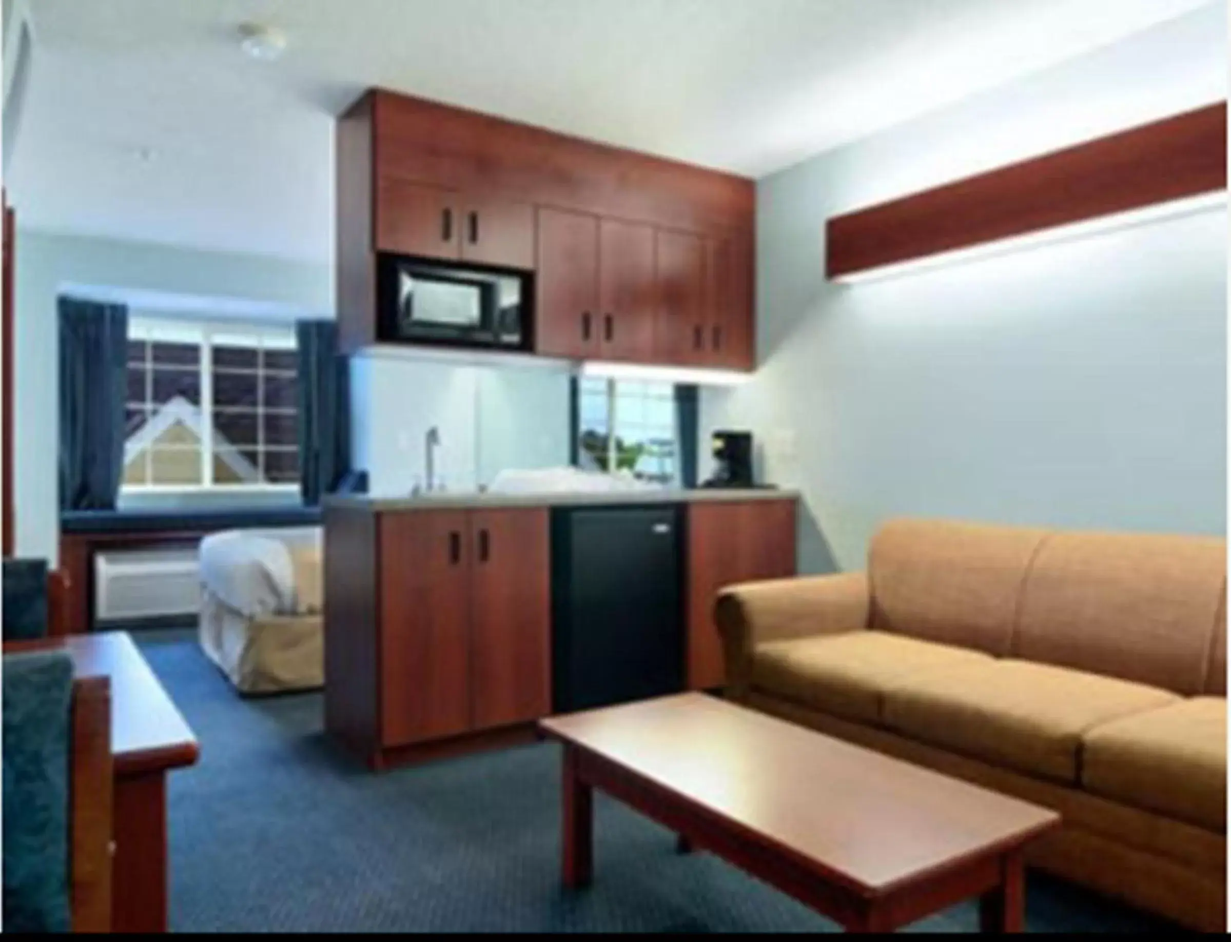 Bedroom, Kitchen/Kitchenette in Microtel Inn & Suites by Wyndham Gardendale