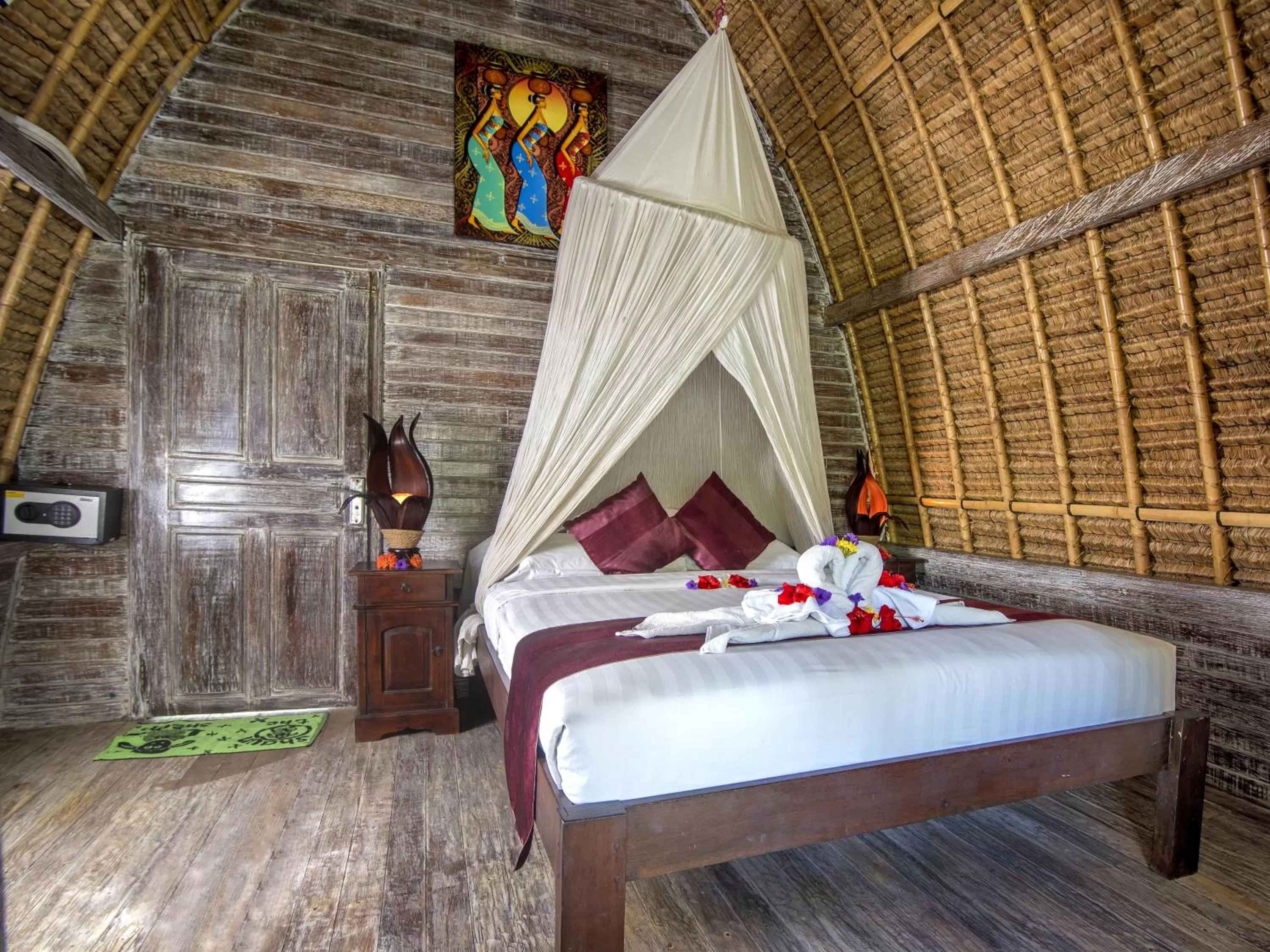 Bed in Mushroom Beach Bungalows