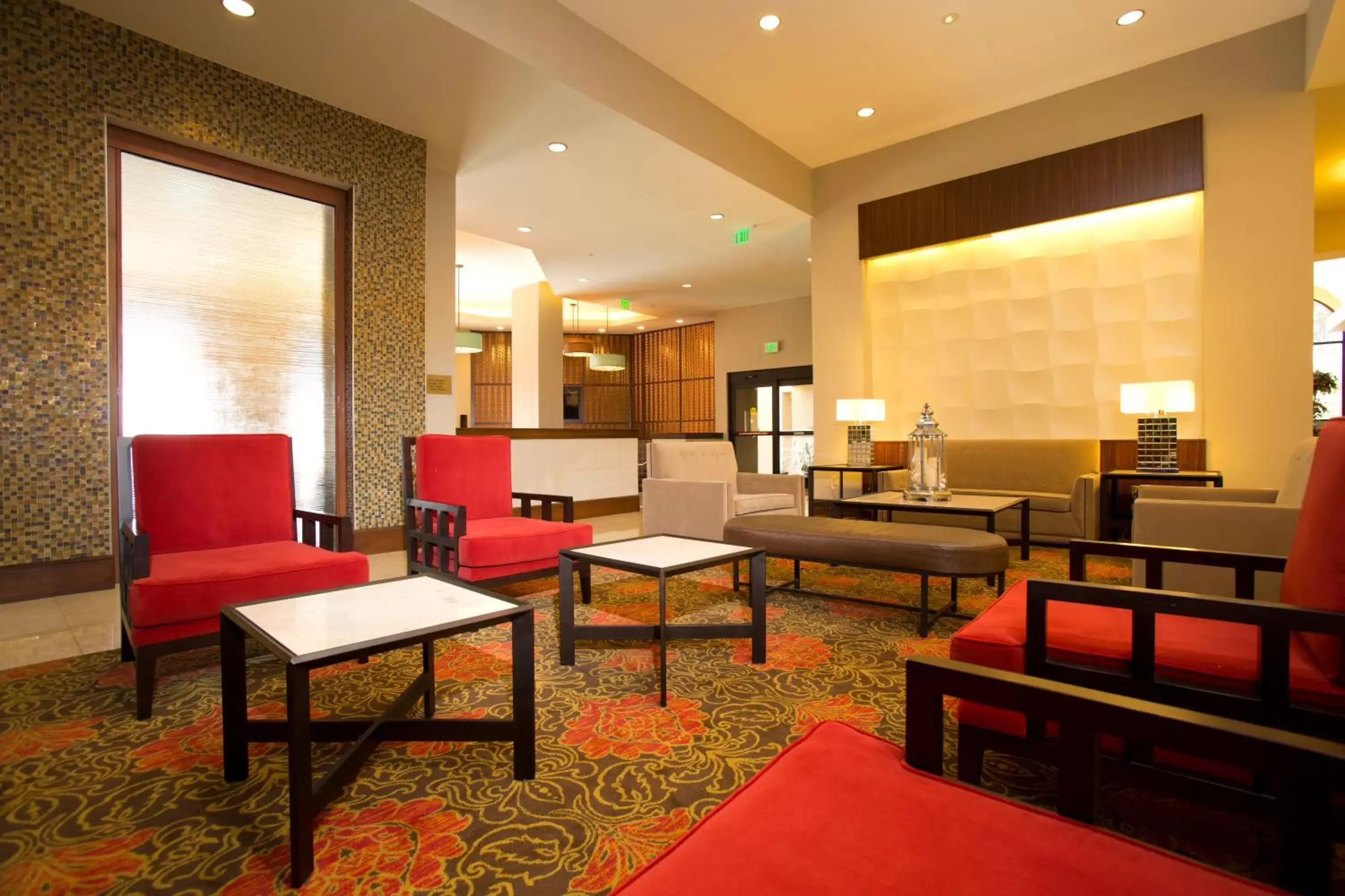 Seating Area in Ramada Suites By Wyndham Orlando International Drive