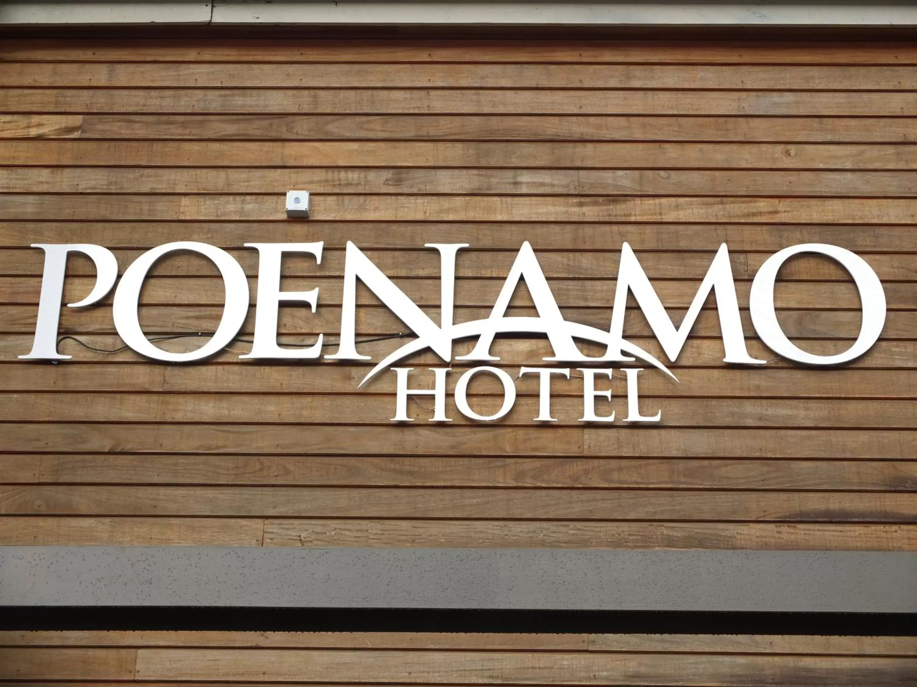Property logo or sign in Poenamo Hotel