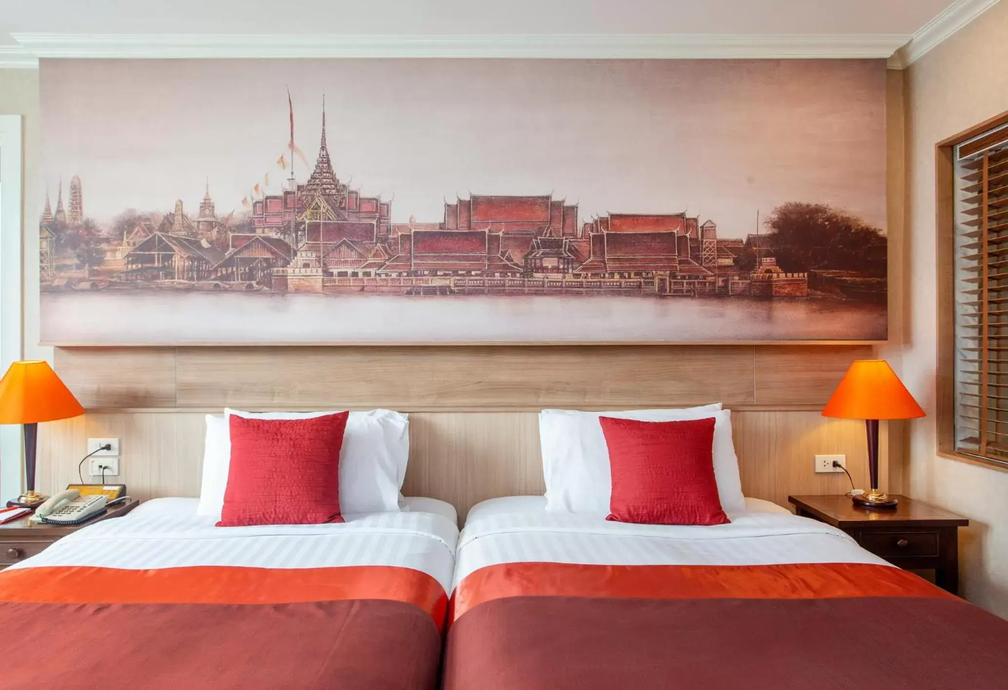 Bed in Ramada Plaza by Wyndham Bangkok Menam Riverside