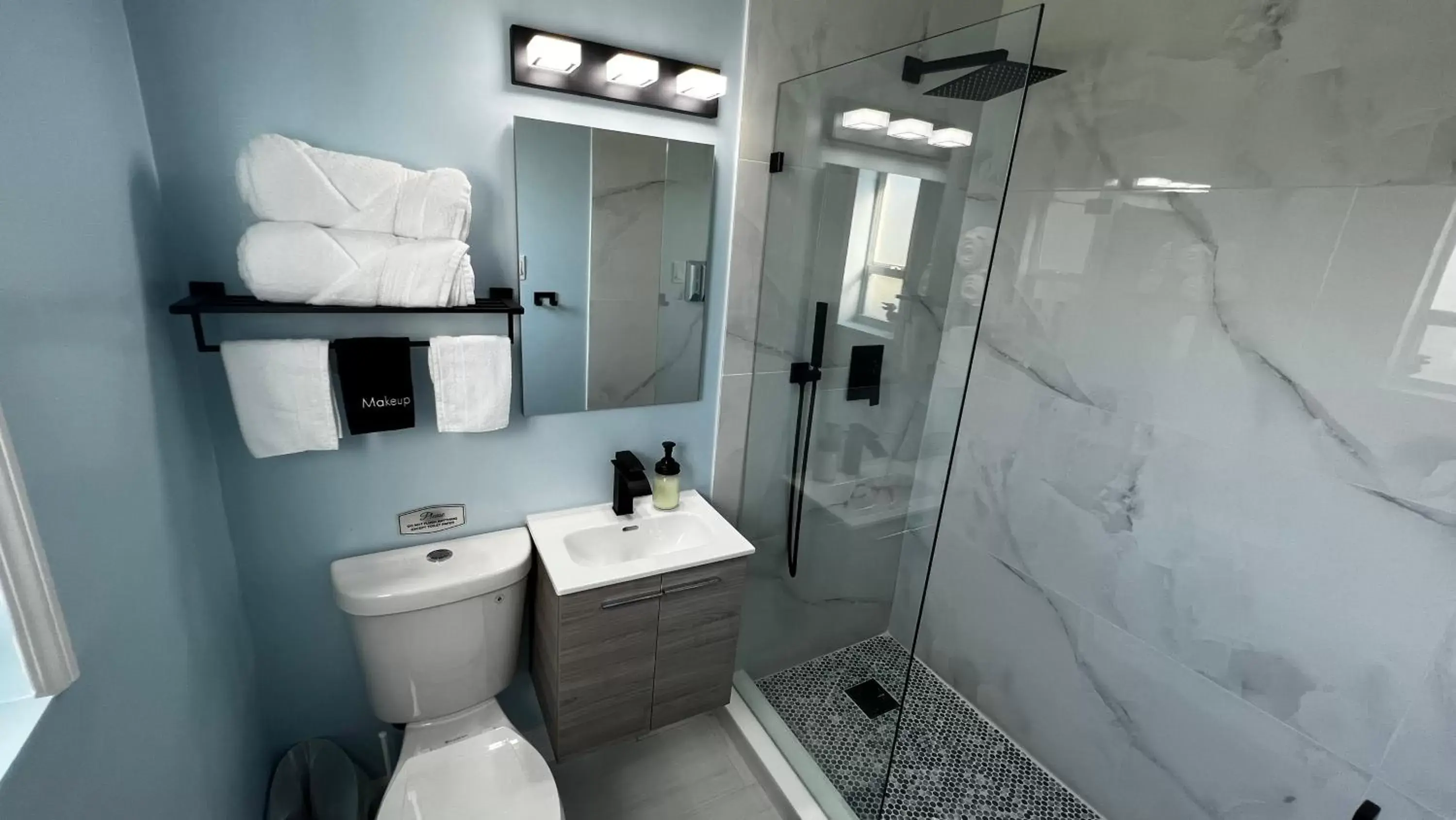 Shower, Bathroom in Oceano Suites Daytona Beach