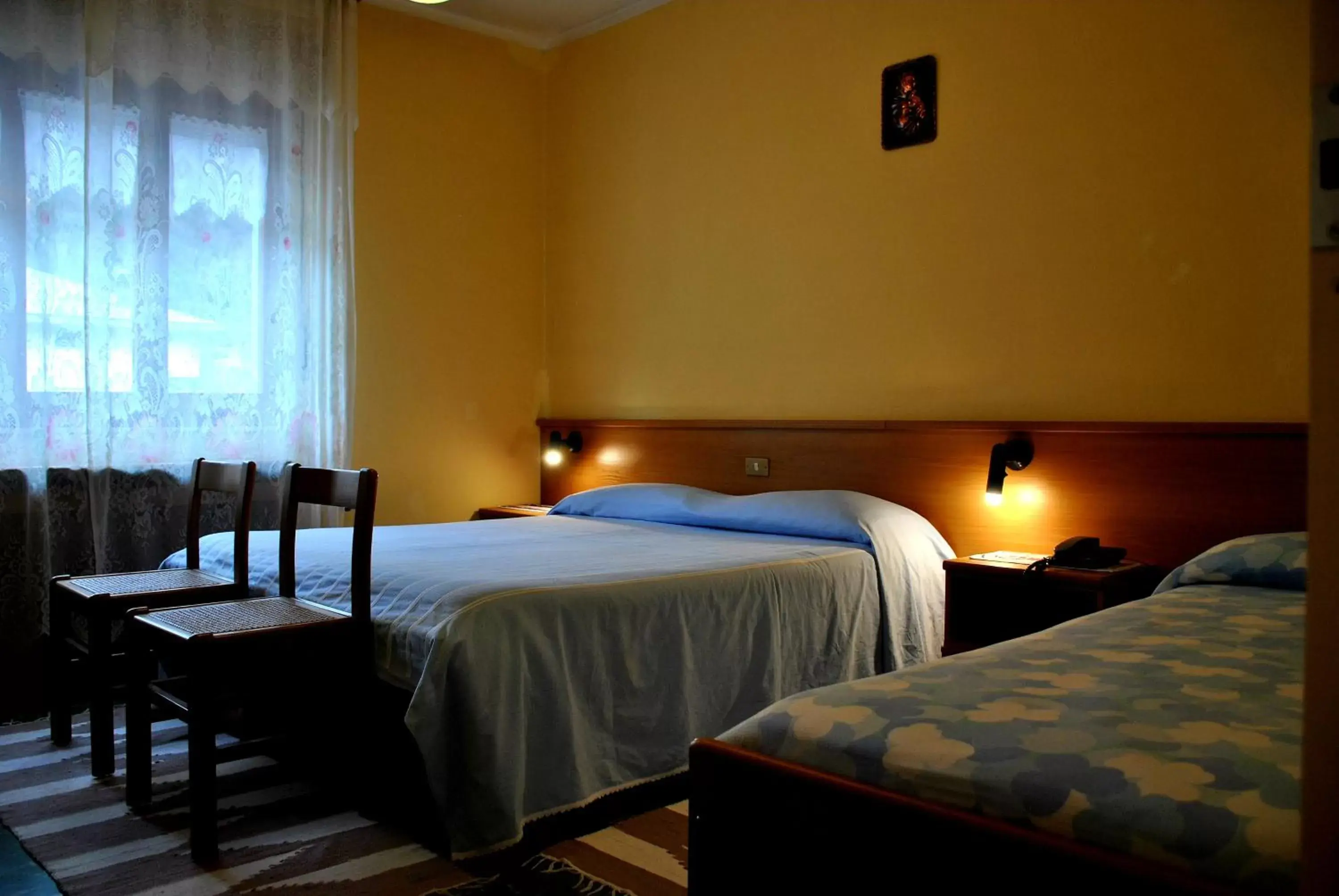 Bed in Albergo Motel Dosdè