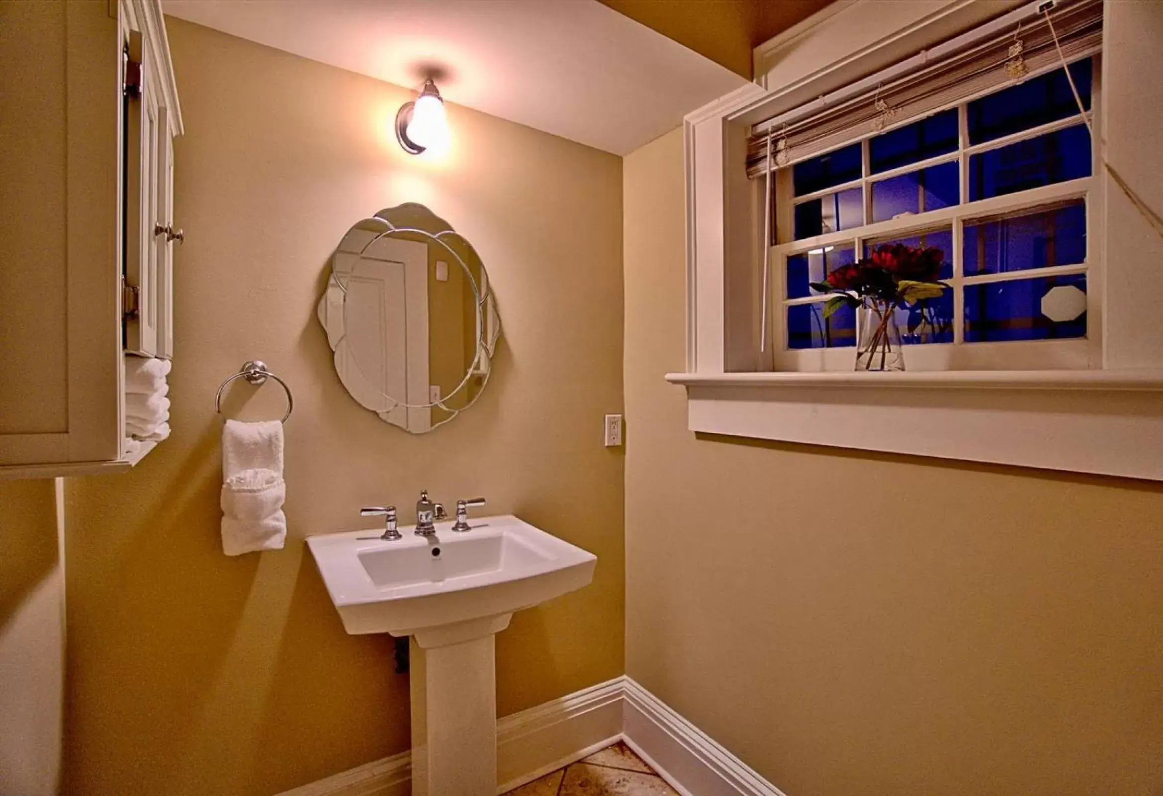 Bathroom in Comfy Carriage House Steps from the River