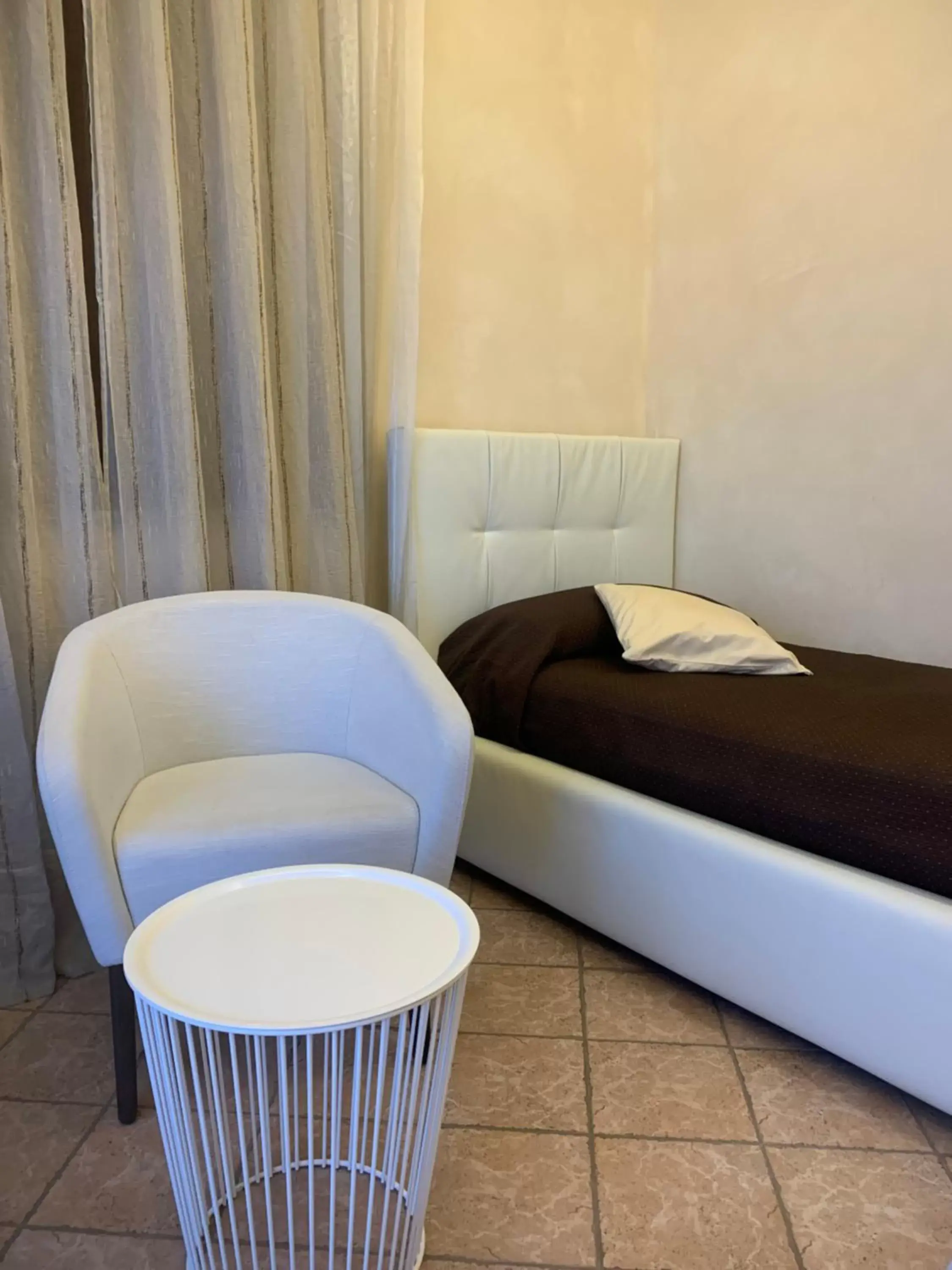 Bed, Seating Area in Locanda La Pernice