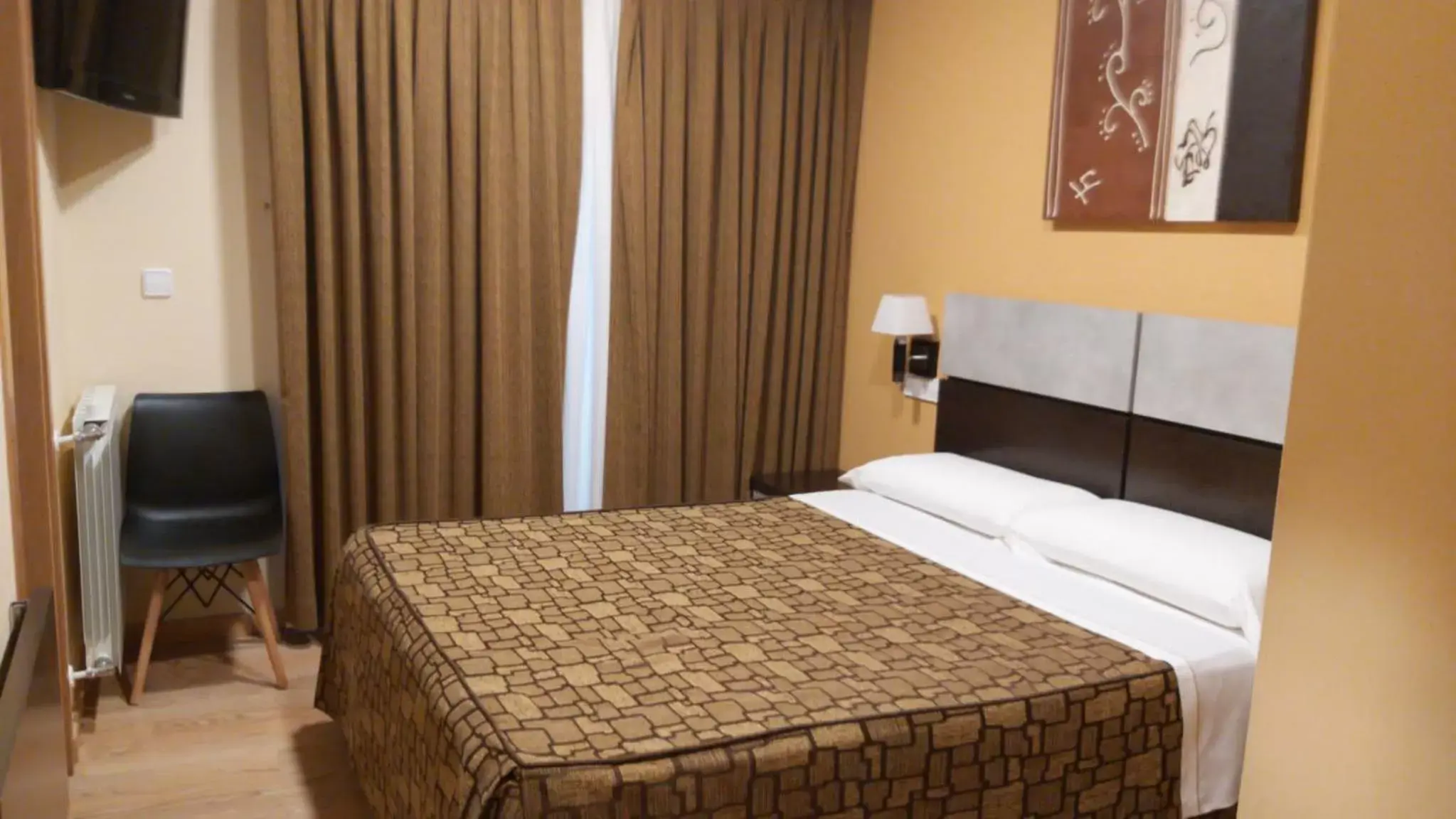 Bed in Hotel Reigosa