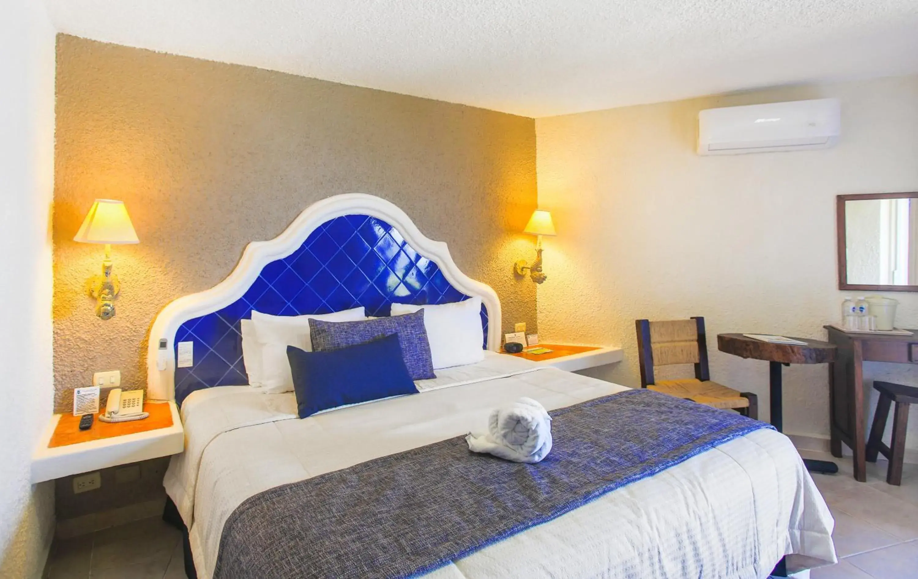 Bed in Casa del Mar Cozumel Hotel & Dive Resort