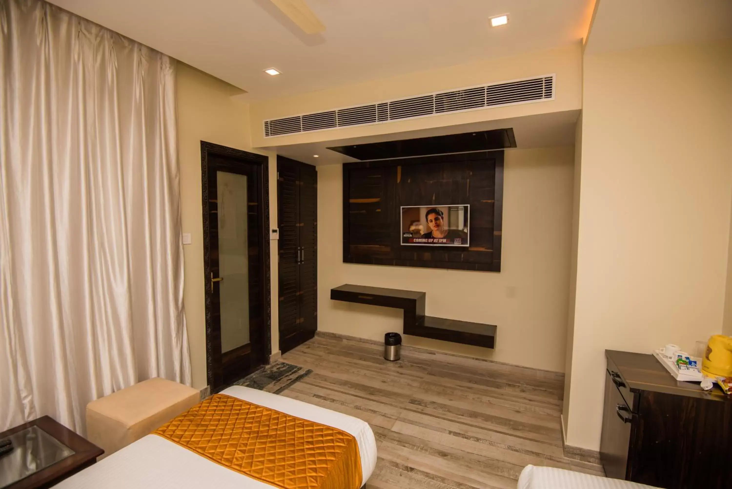 Bedroom, TV/Entertainment Center in Hotel Heritage Inn at Assi Ghat