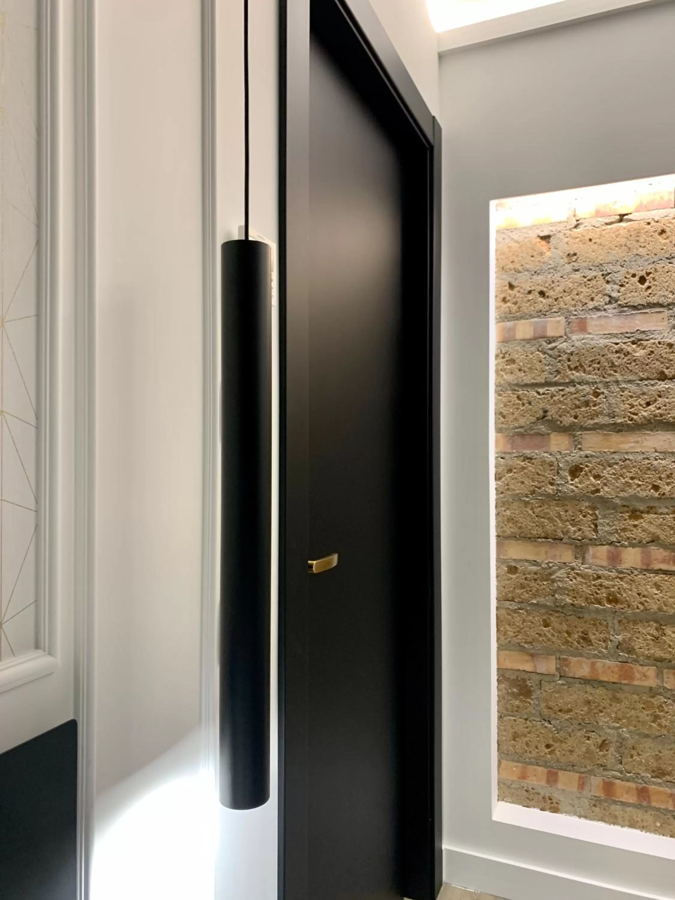 Bedroom, TV/Entertainment Center in Toledo Boutique Rooms