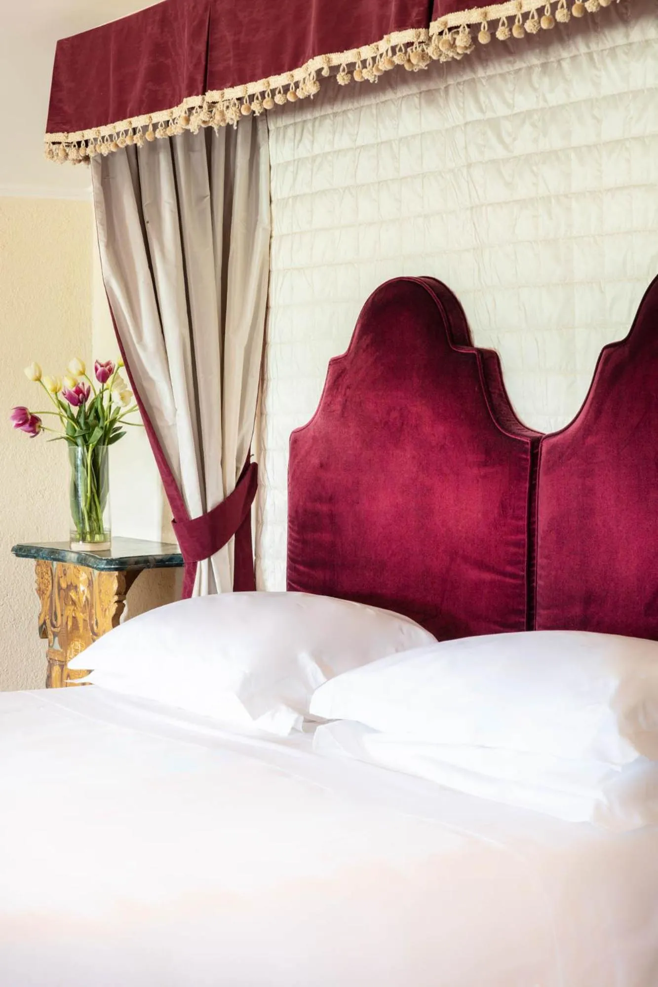 Bed in La Posta Vecchia Hotel