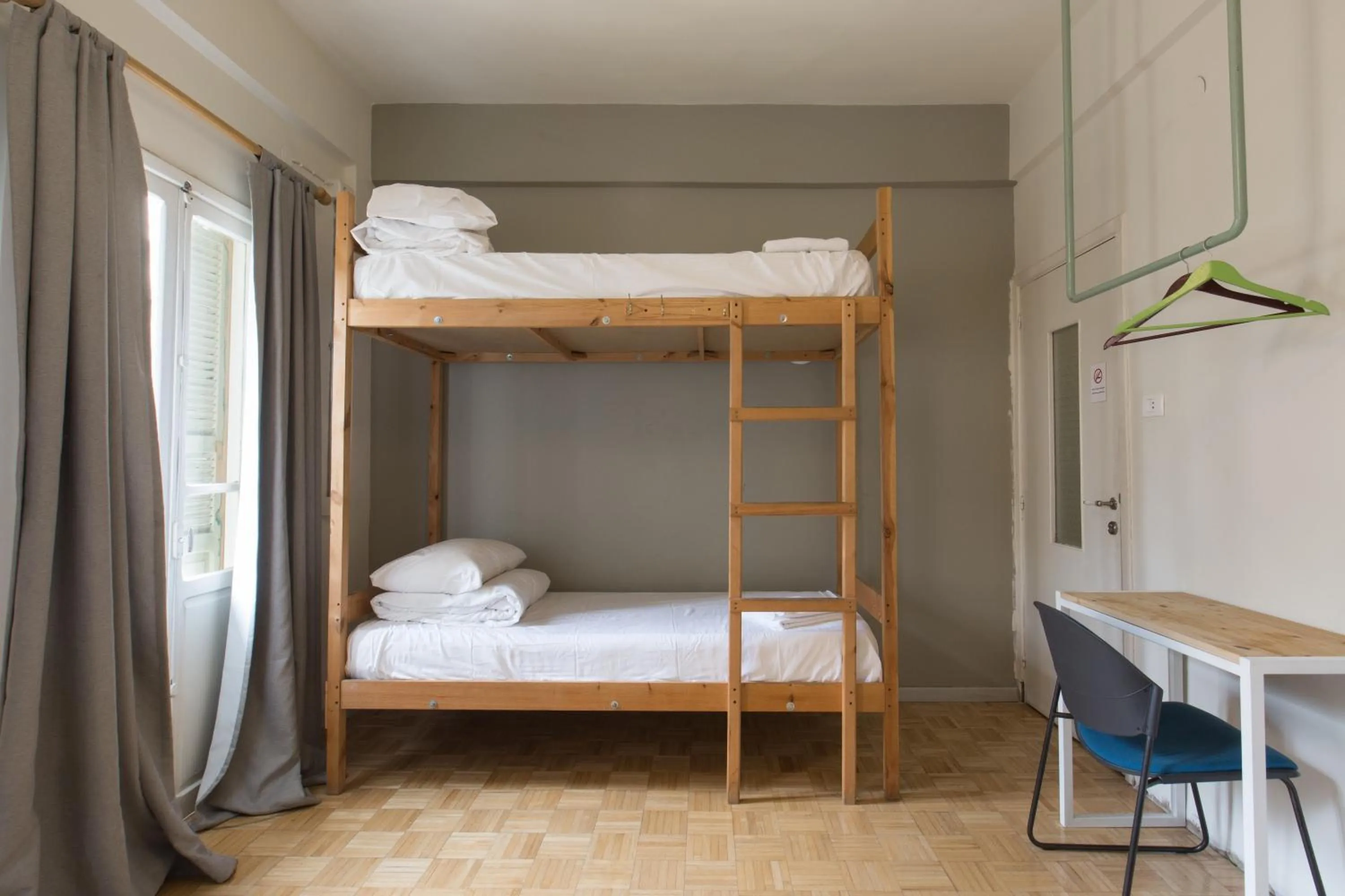 Bed in The Grand Meshmosh Hotel