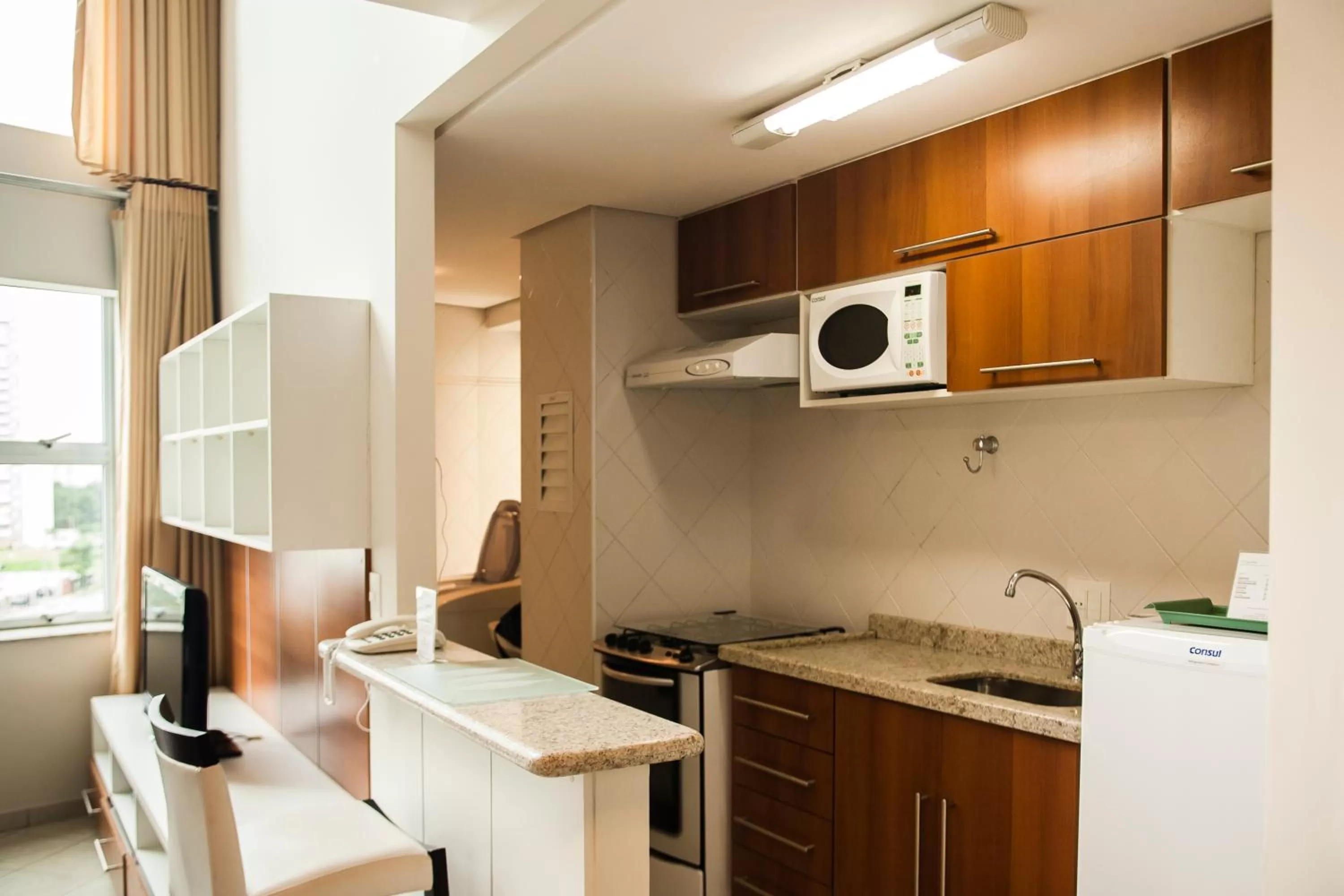 Kitchen or kitchenette in Hotel City Hall