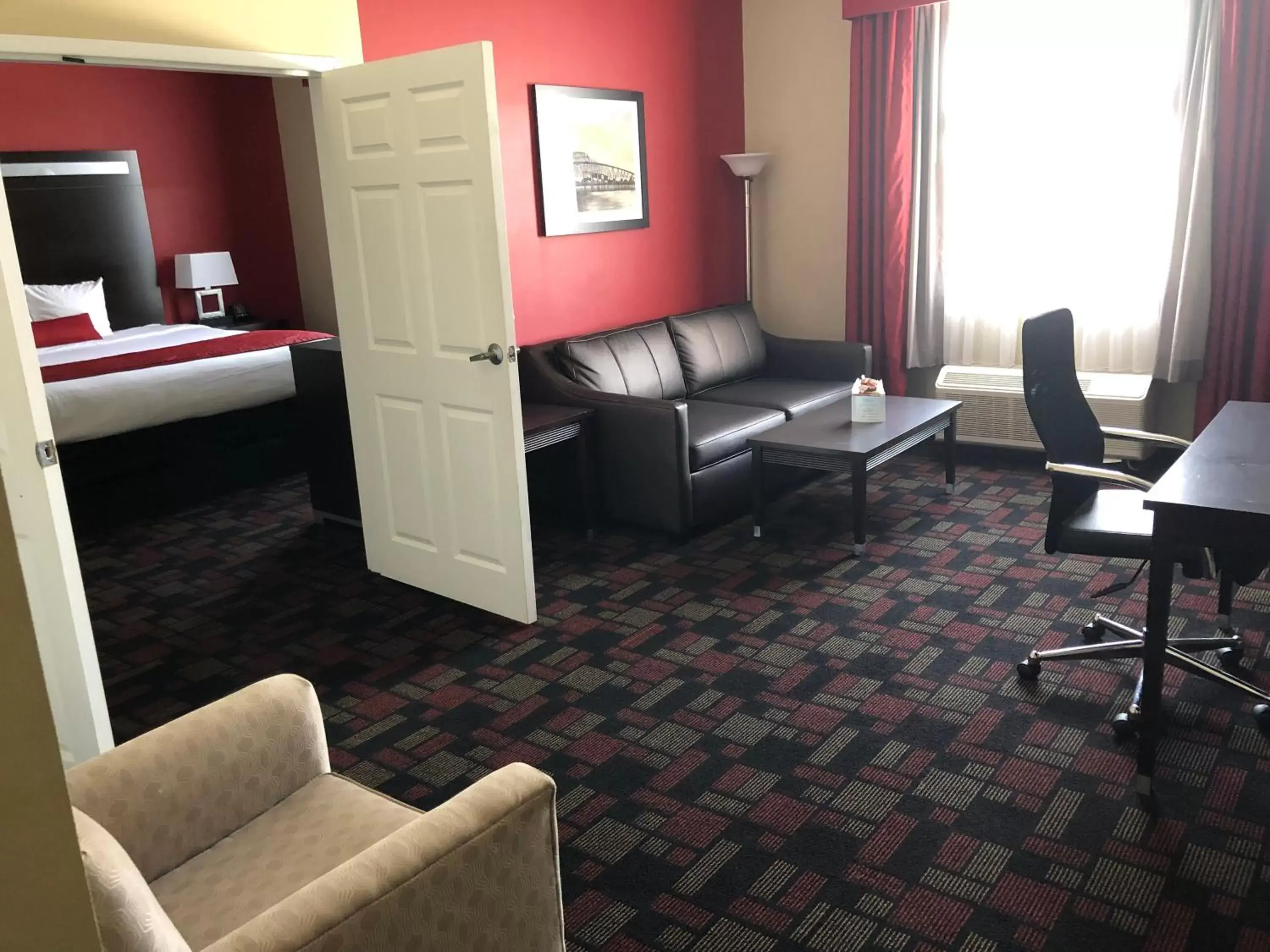 Living room, Seating Area in Wingate by Wyndham Lake Charles Casino Area