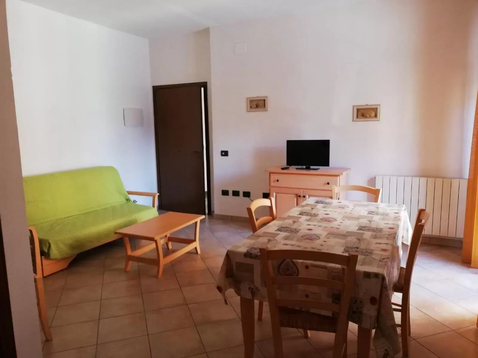 Living room, Dining Area in Le Coltie - affittacamere e appartamenti