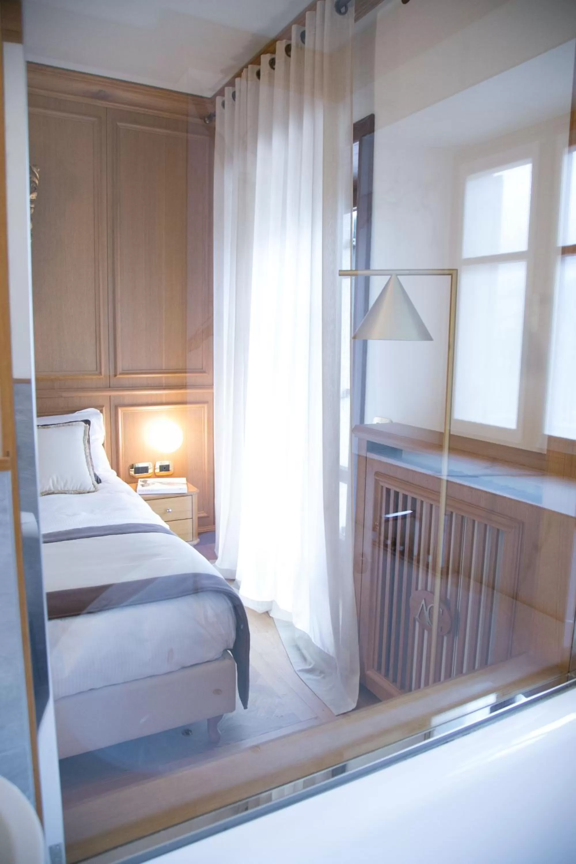 Decorative detail, Bed in Ambra Cortina Luxury&Fashion Hotel