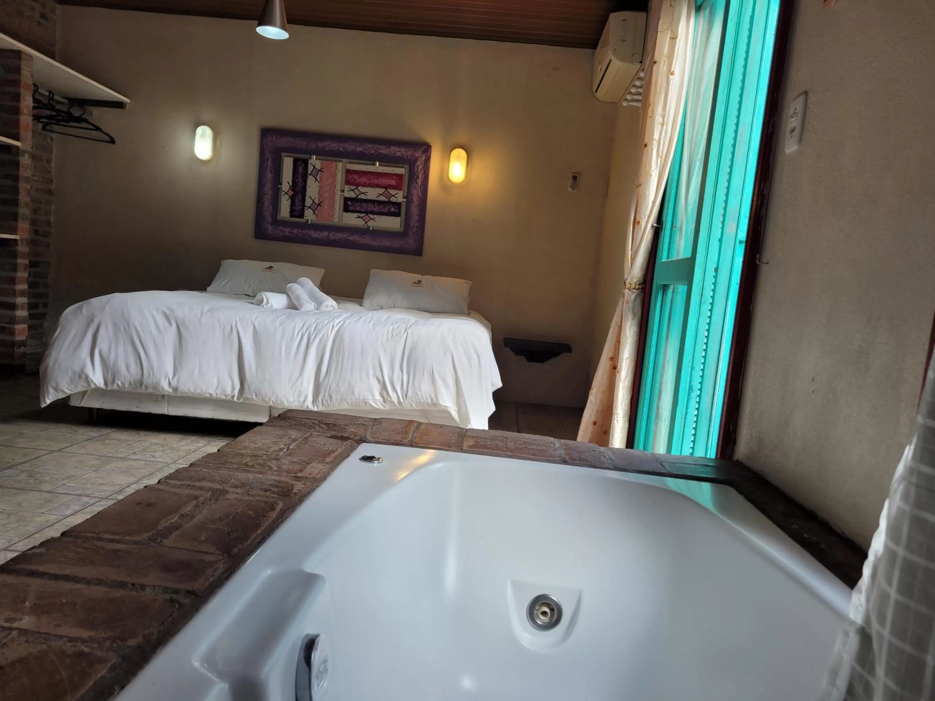 Bed in Pousada da Chacara