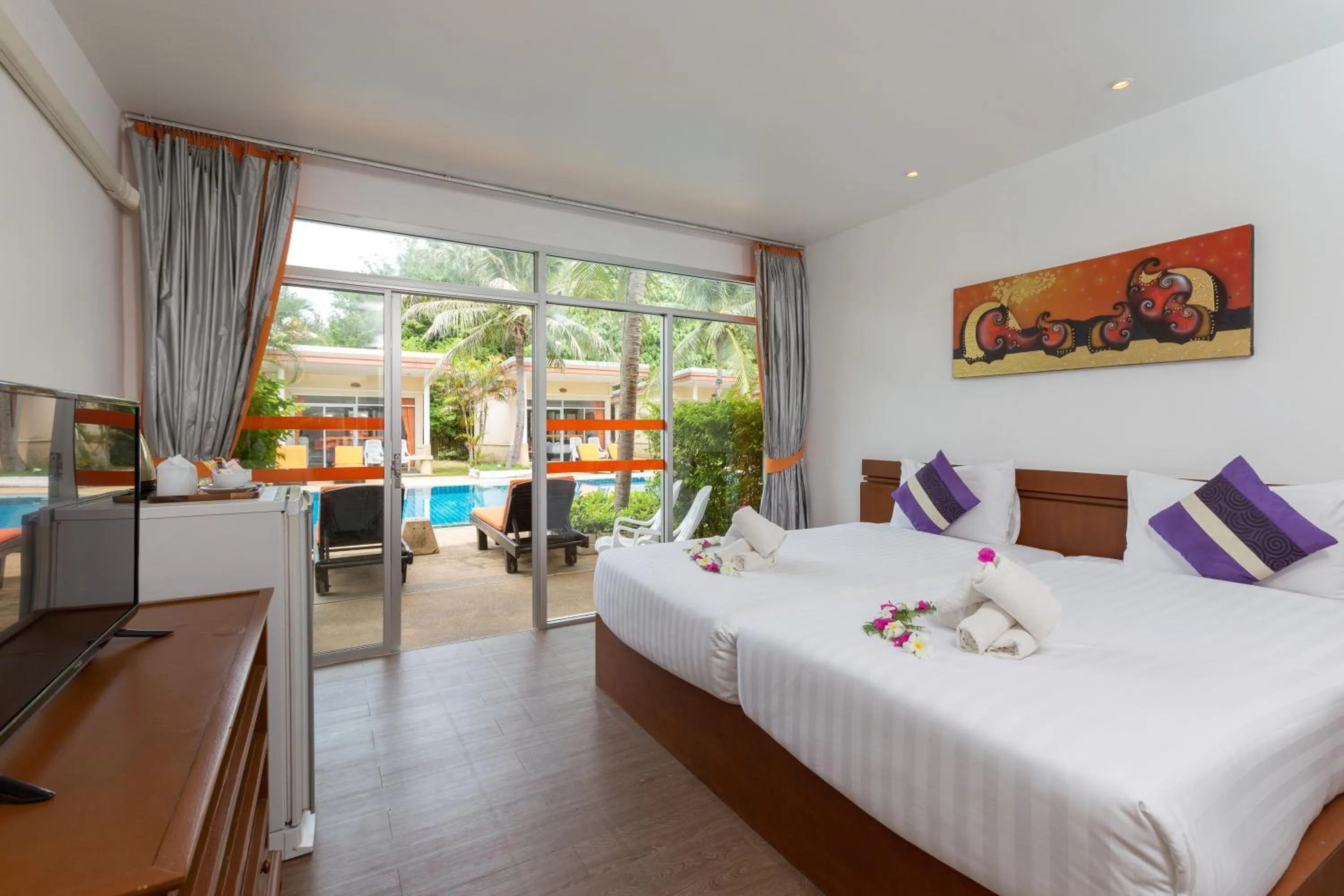 Pool view, Bed in Phuket Sea Resort SHA Extra Plus