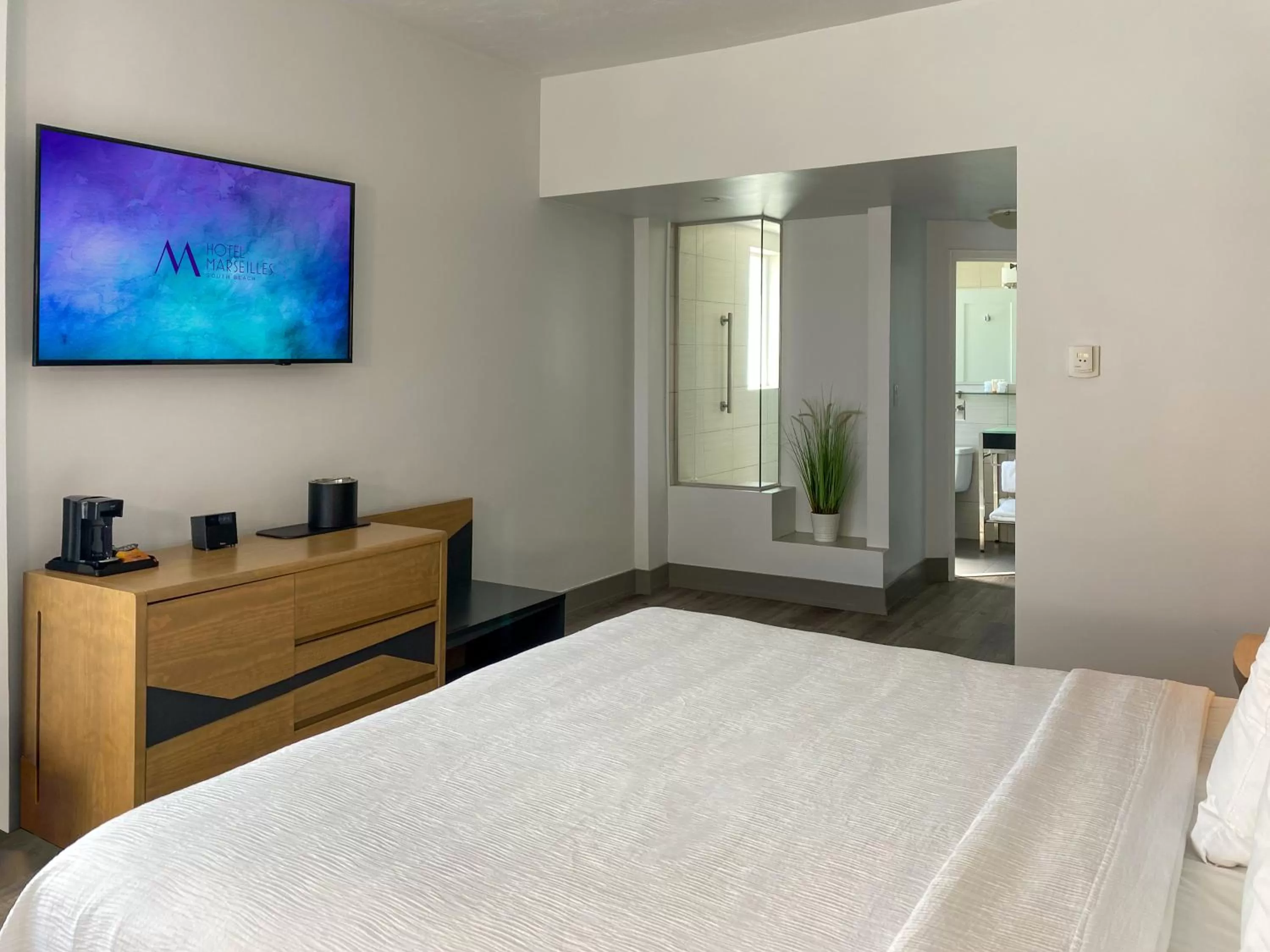 Bathroom, Bed in Marseilles Beachfront Hotel