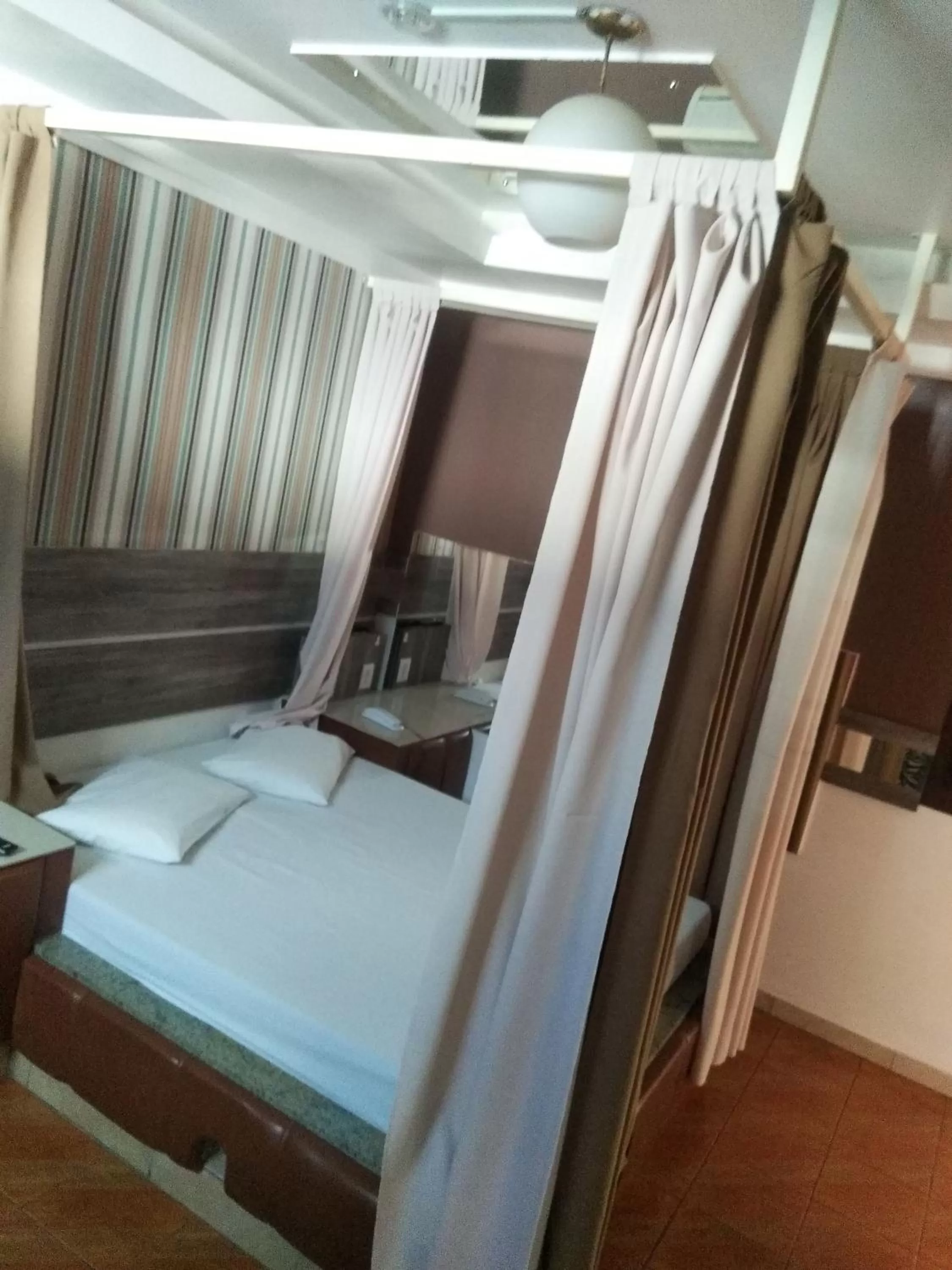 Bed in Classic Hotel e Motel