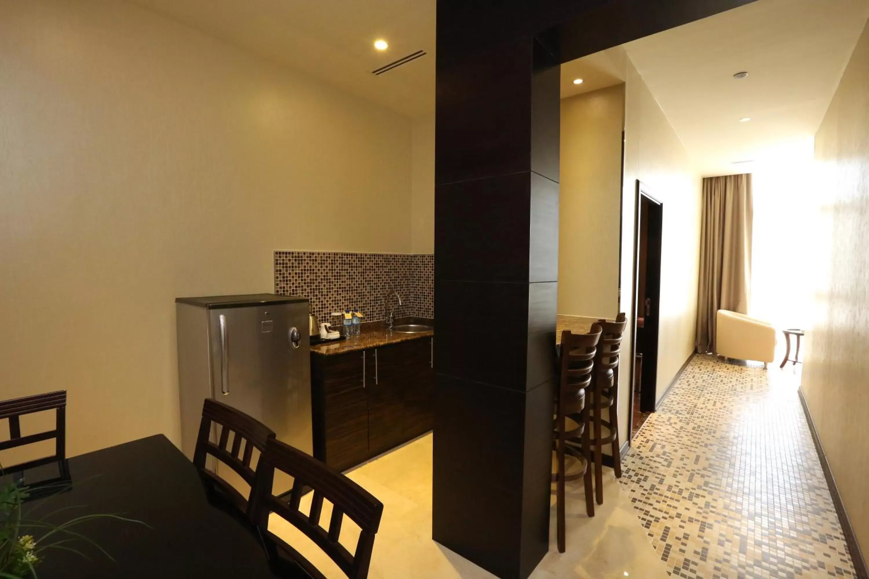 Kitchen or kitchenette, Dining Area in Nehal Hotel