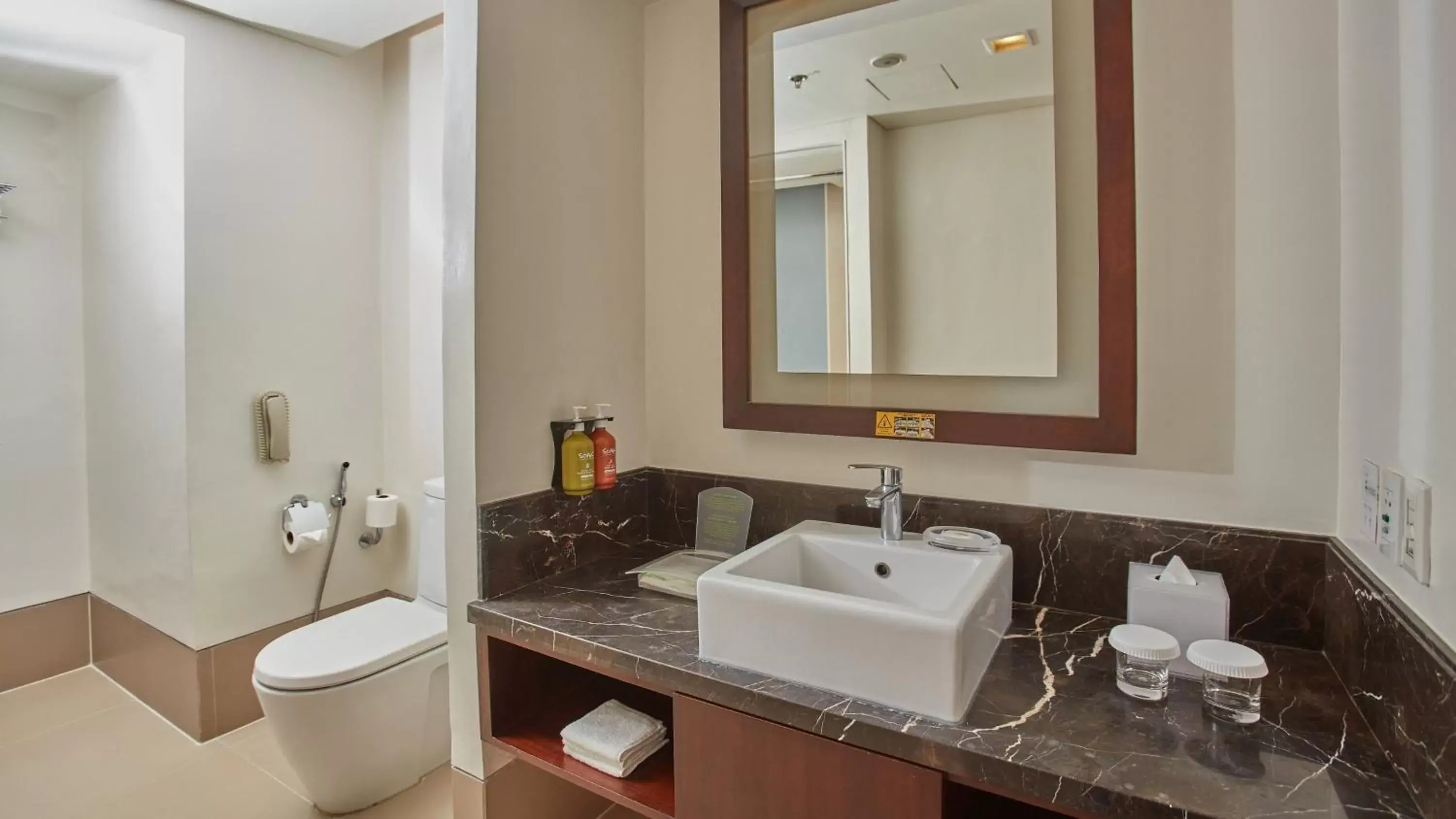Bathroom in Holiday Inn & Suites Makati, an IHG Hotel