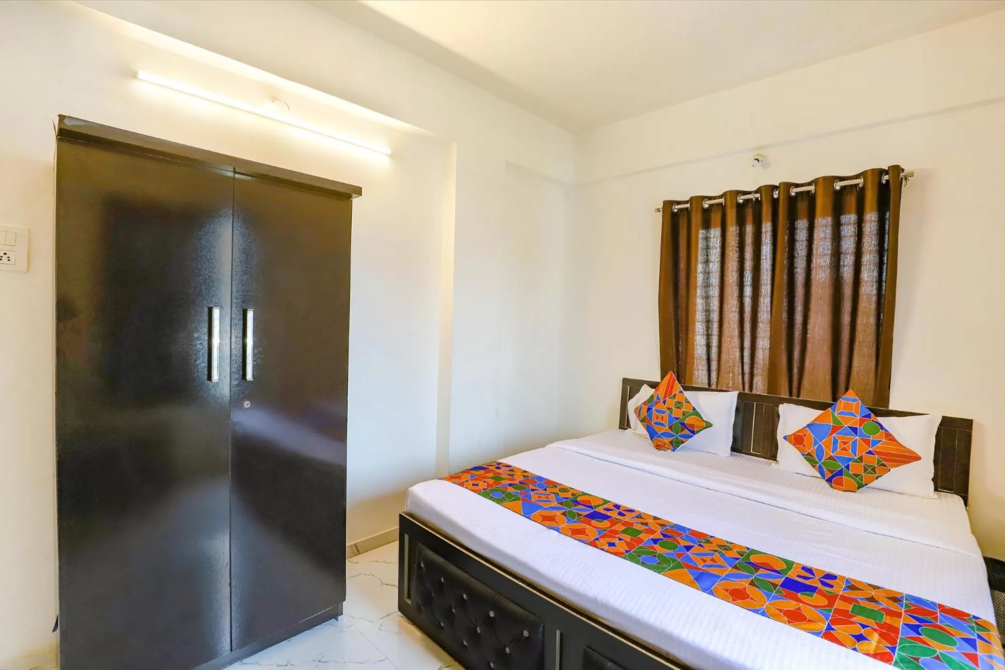 Bed in FabHotel Elite Palm