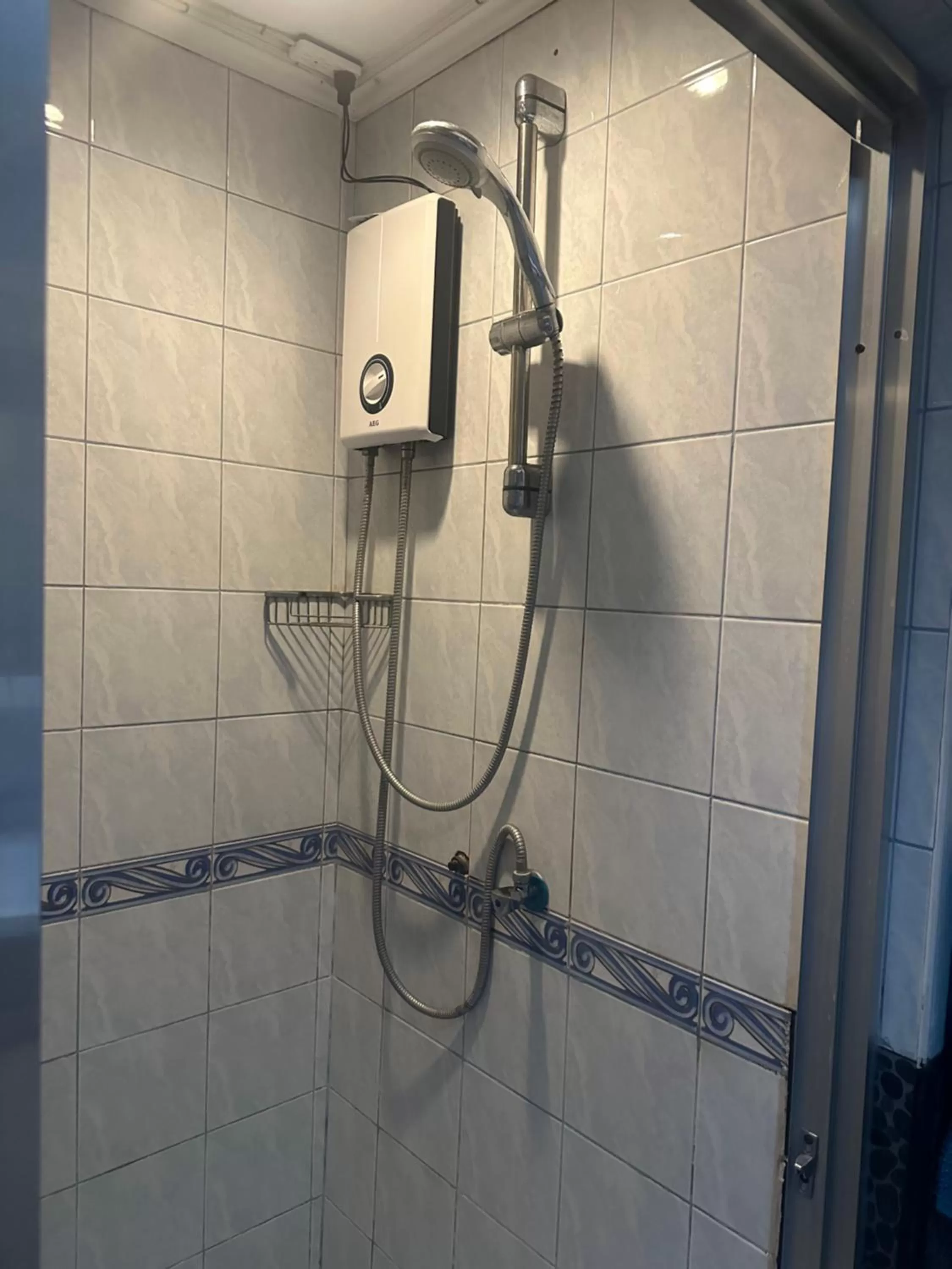 Shower in Lala Panzi Bed and Breakfast