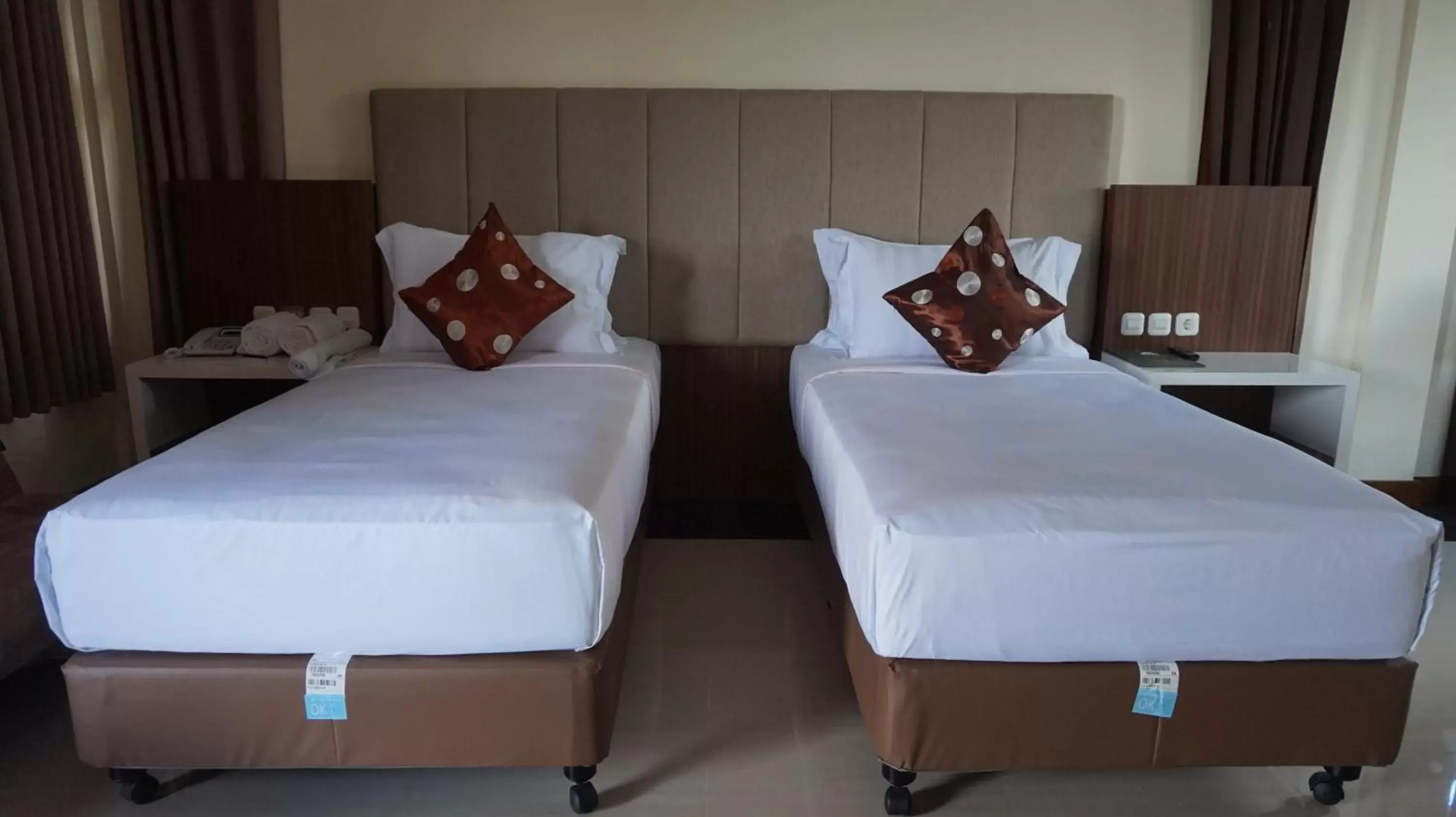 Bed in Grand Harvest Resort & Villas