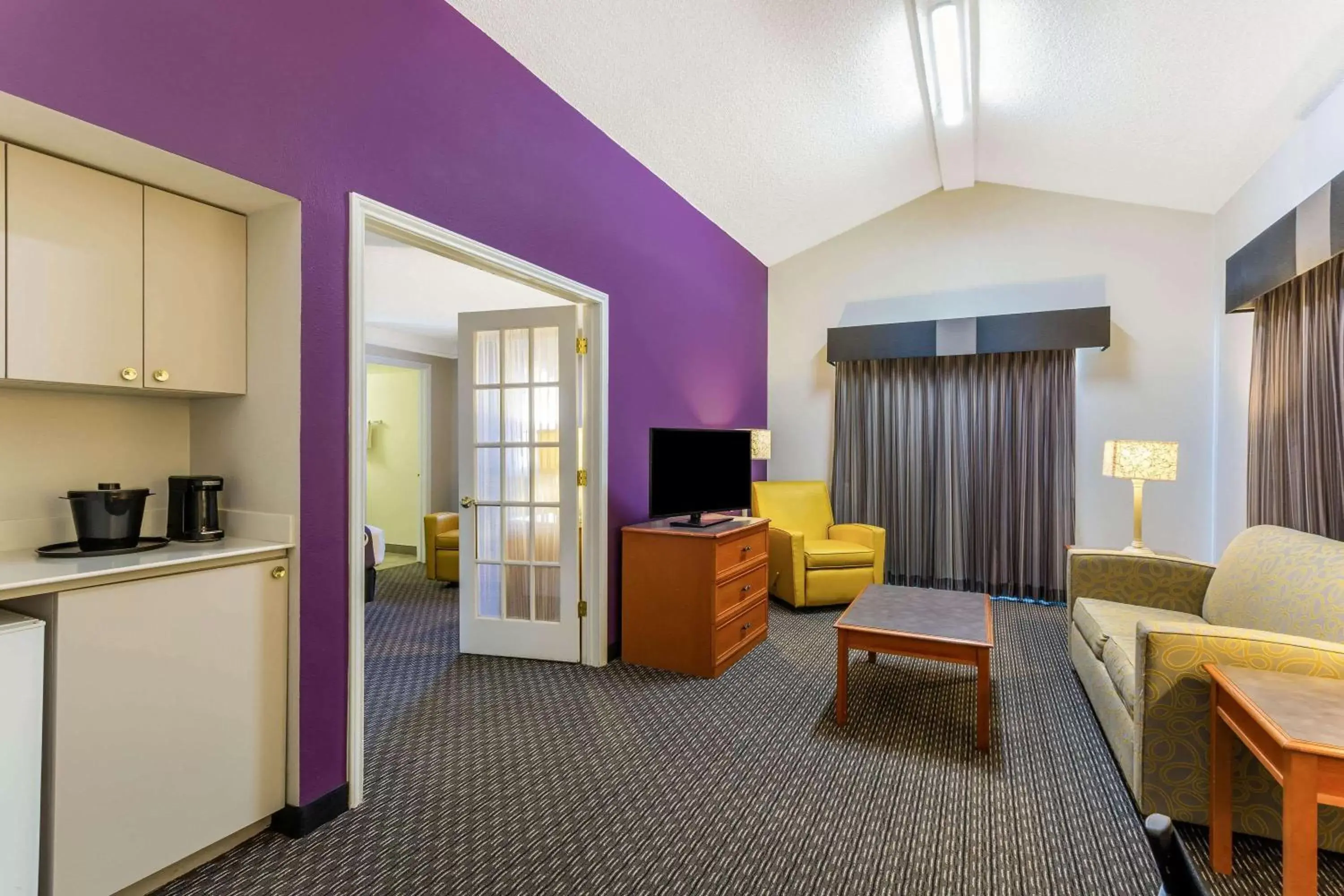 Photo of the whole room, TV/Entertainment Center in La Quinta Inn by Wyndham Odessa
