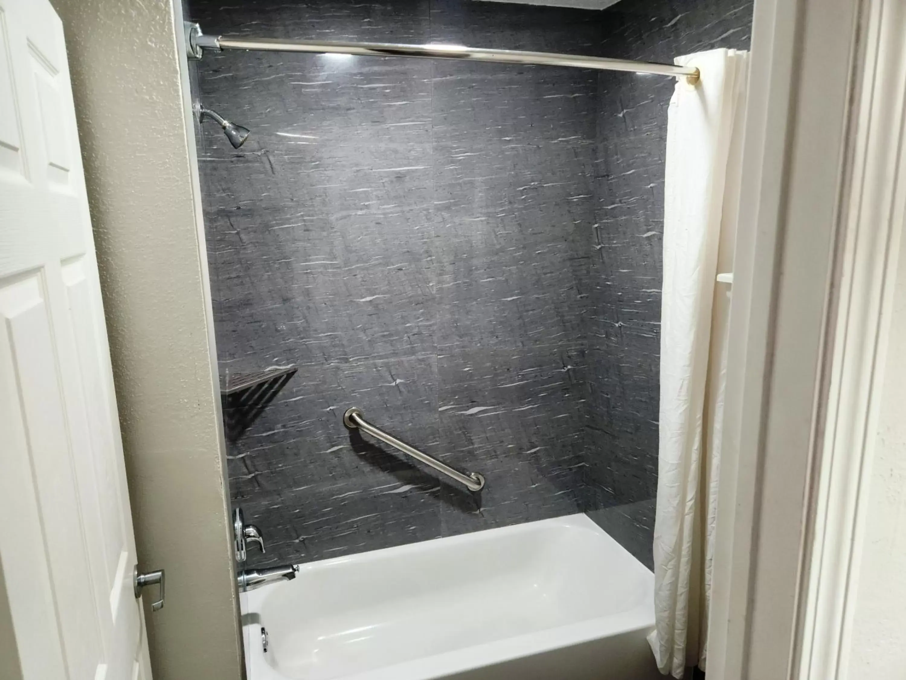 Shower, Bathroom in Express Inn Hobby Airport