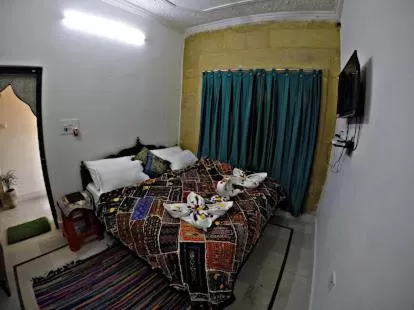 Bed in Hotel Murad Haveli