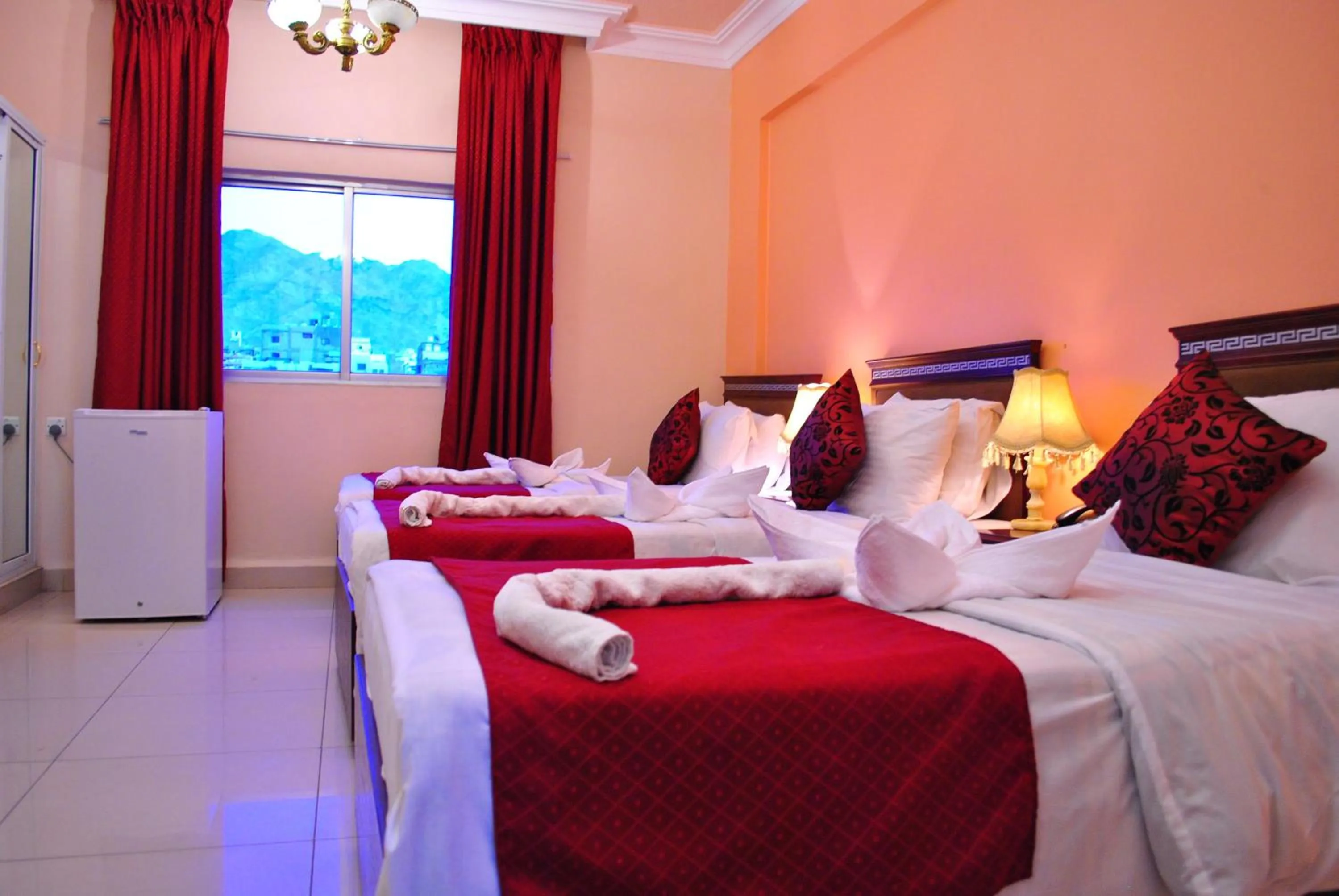 Bed in Al Qidra Hotel & Suites Aqaba