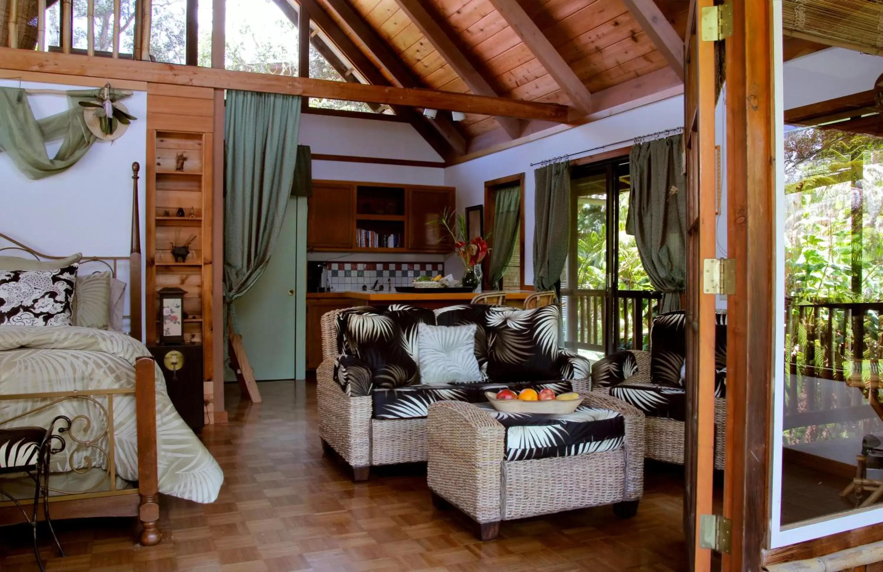 Bed, Seating Area in Lotus Garden Cottages