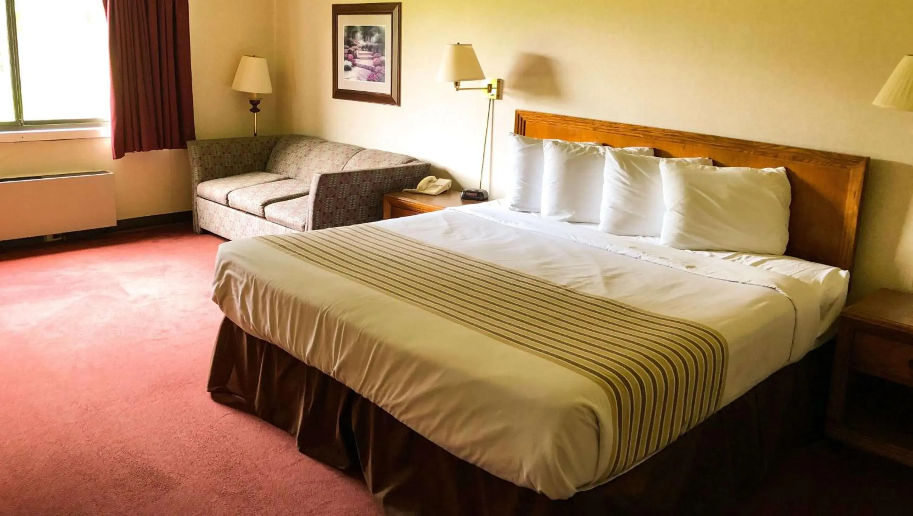 Photo of the whole room, Bed in Magnuson Hotel Dixon