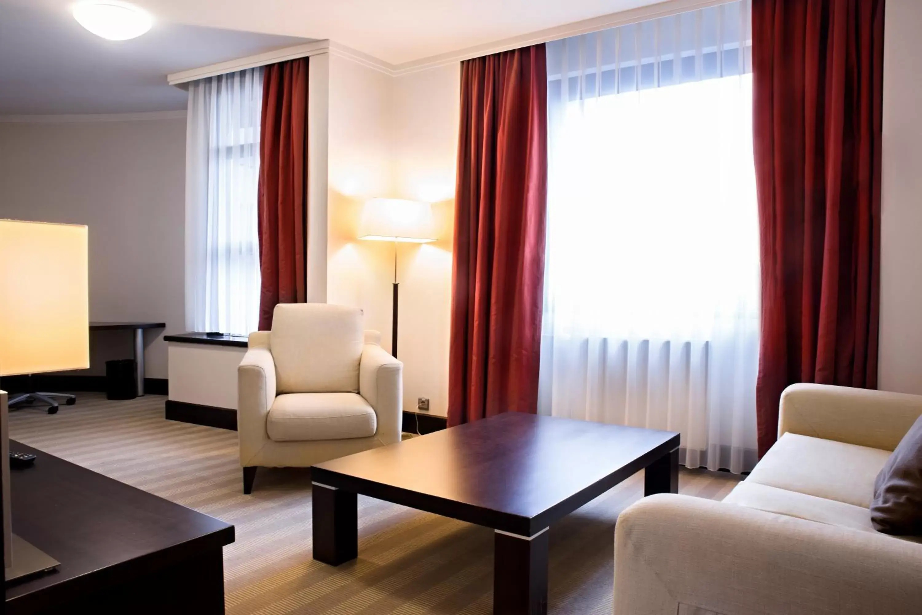 Bedroom, Seating Area in Crowne Plaza Bratislava, an IHG Hotel