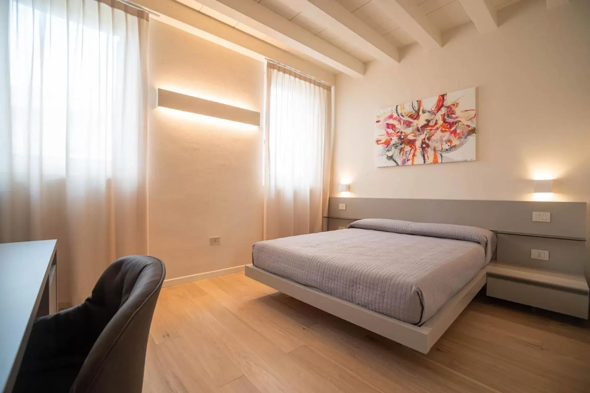 Bed in Maison Calcirelli rooms