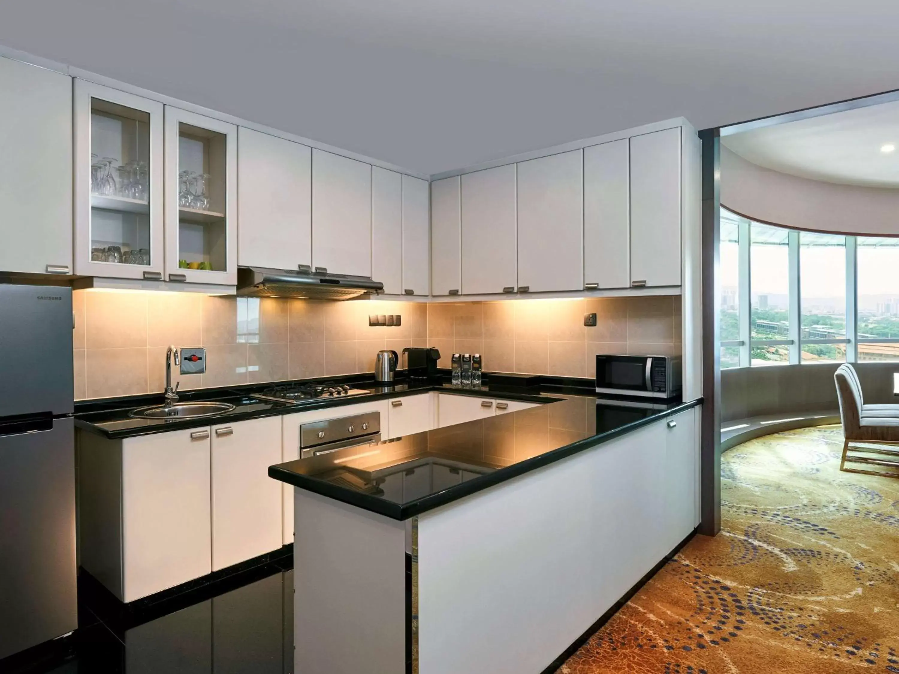 Photo of the whole room, Kitchen/Kitchenette in Pullman Kuala Lumpur City Centre Hotel & Residences