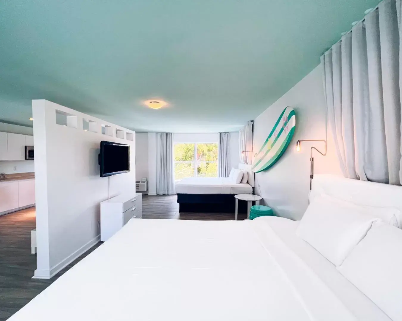 Bed in Aqua Hotel