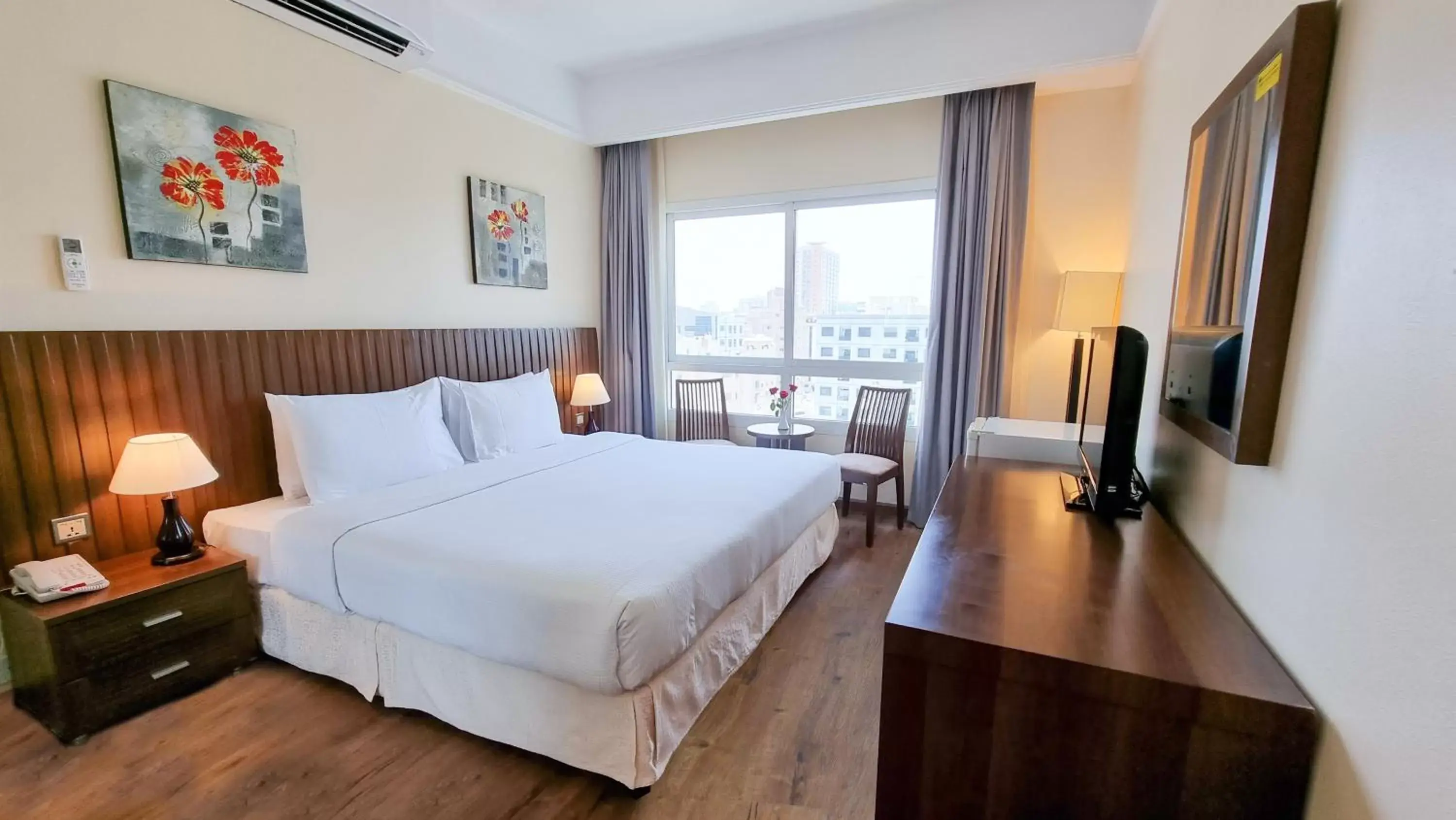 Bedroom, Bed in Ramada by Wyndham Beach Hotel Ajman