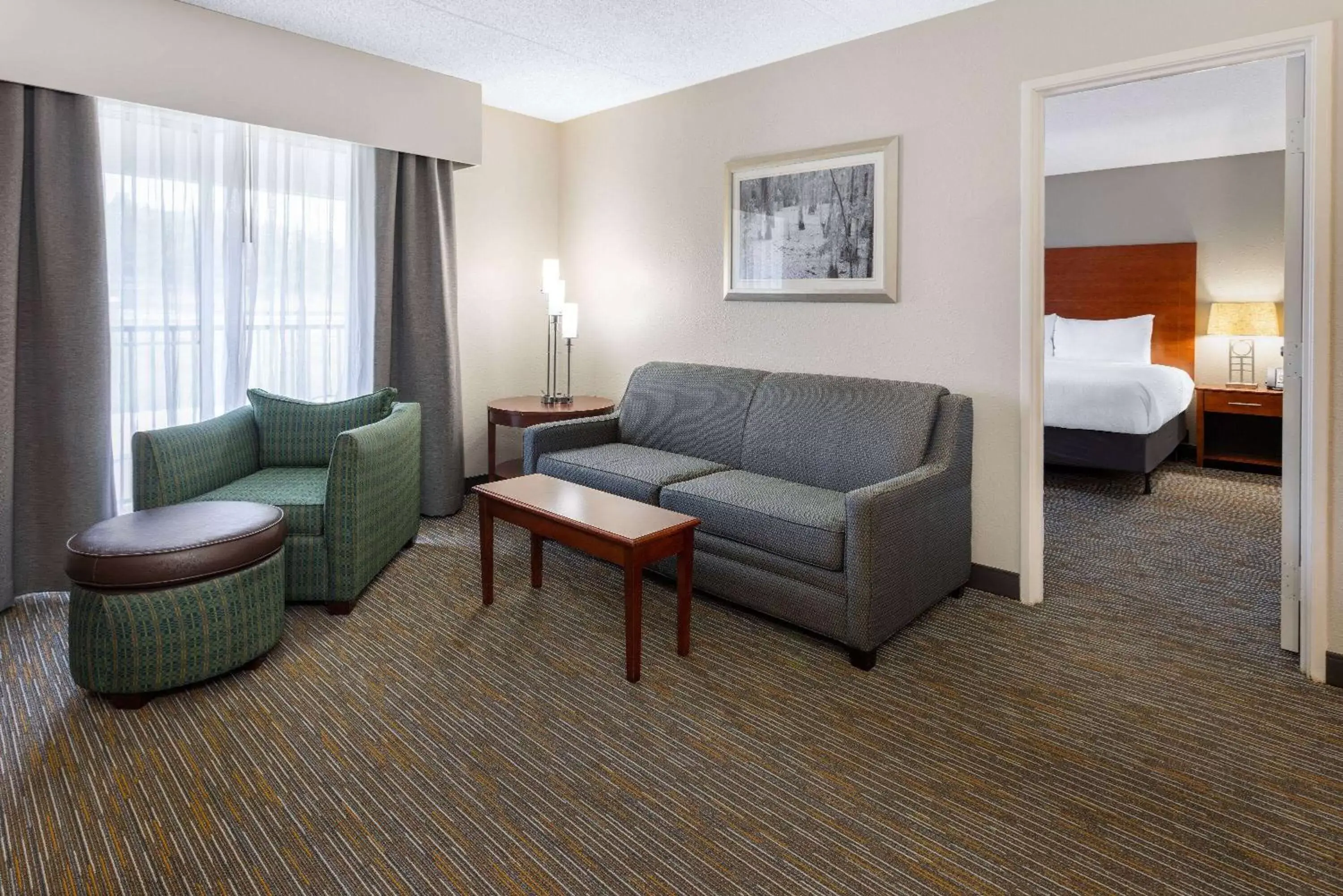 Bed, Seating Area in Wingate by Wyndham Valdosta/Moody AFB