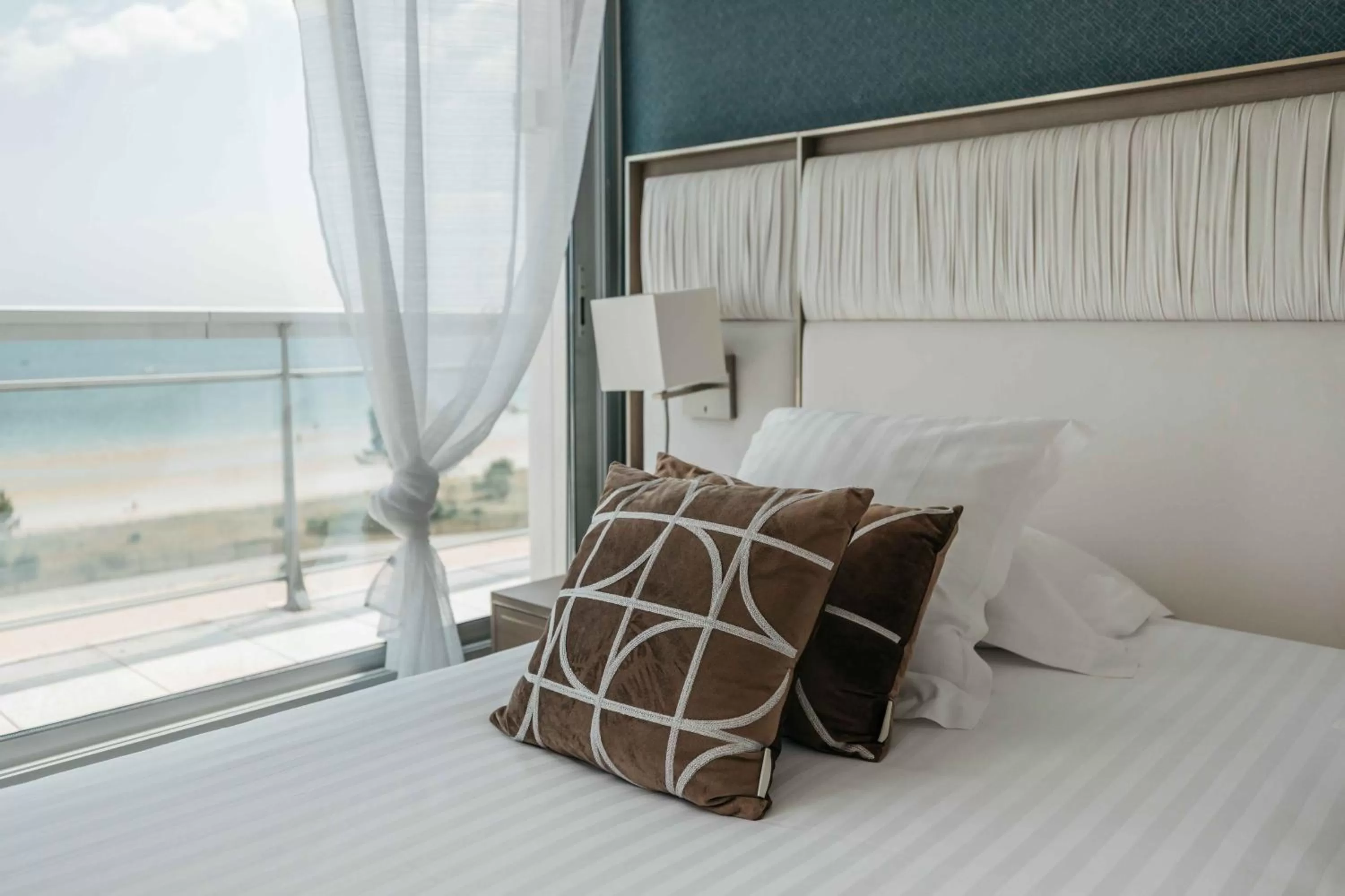 Bed in Le Diana Hôtel & Spa