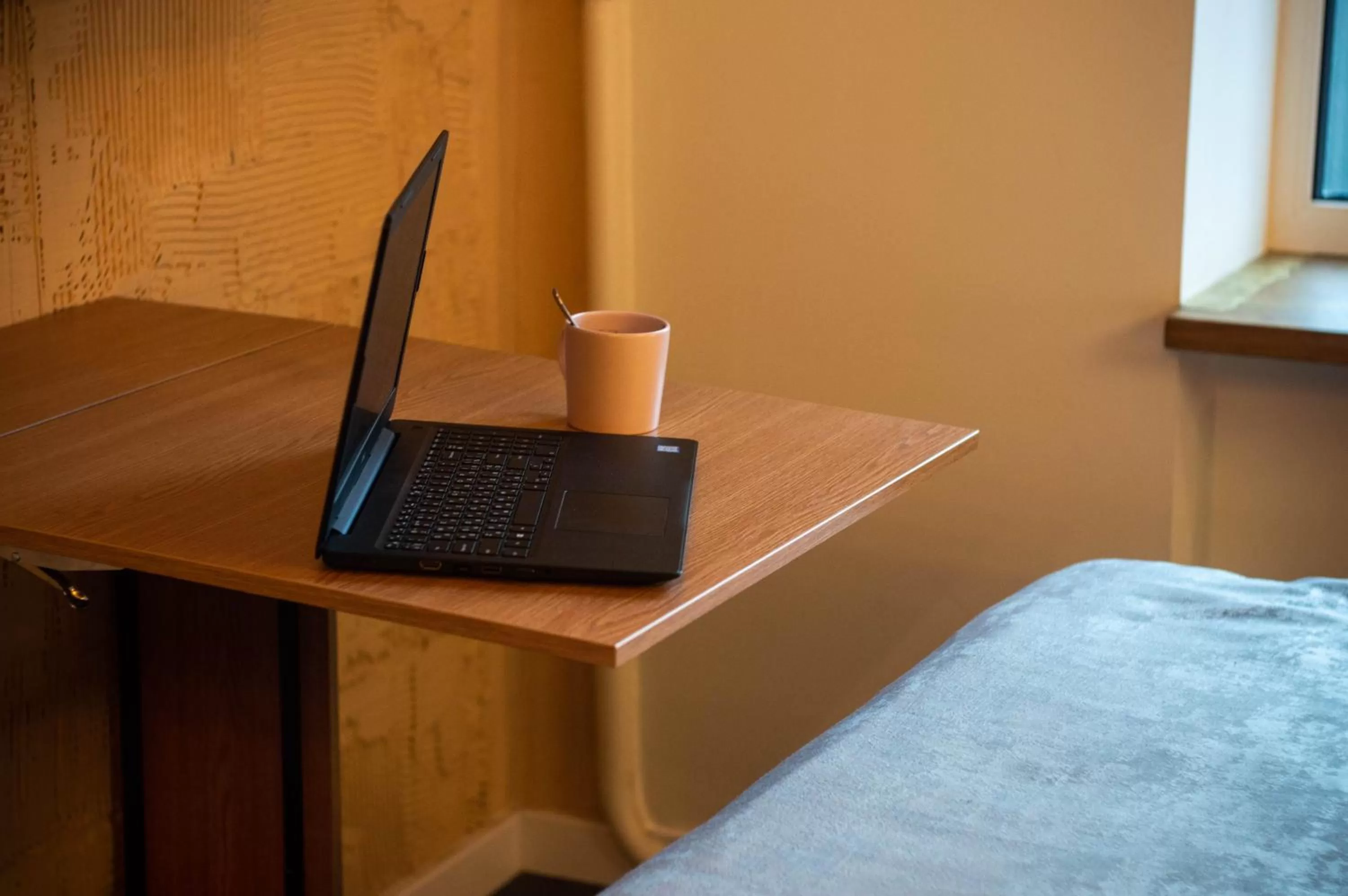 Decorative detail, Bed in Kyiv Panorama Apartments near Gulliver