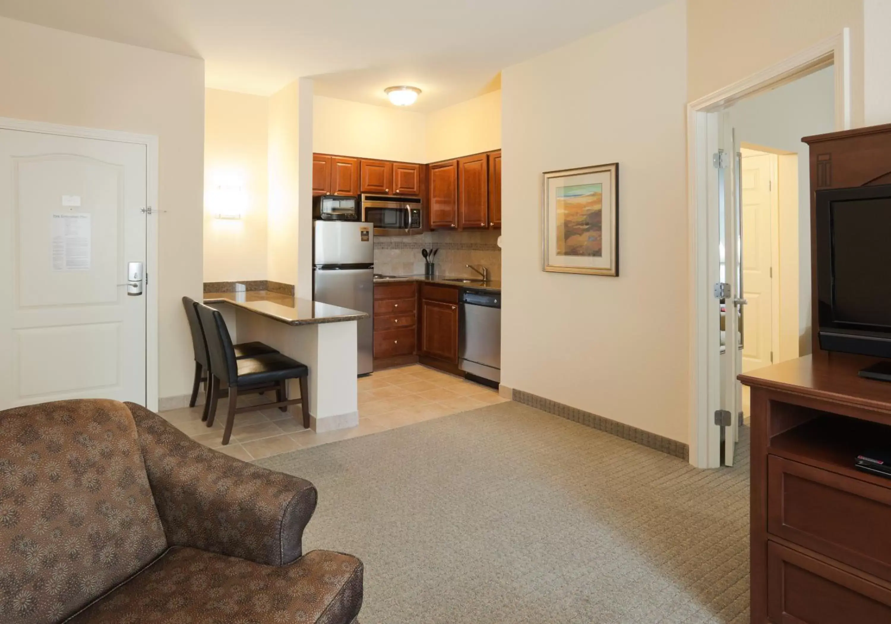 Photo of the whole room, Kitchen/Kitchenette in Staybridge Suites Lafayette-Airport, an IHG Hotel