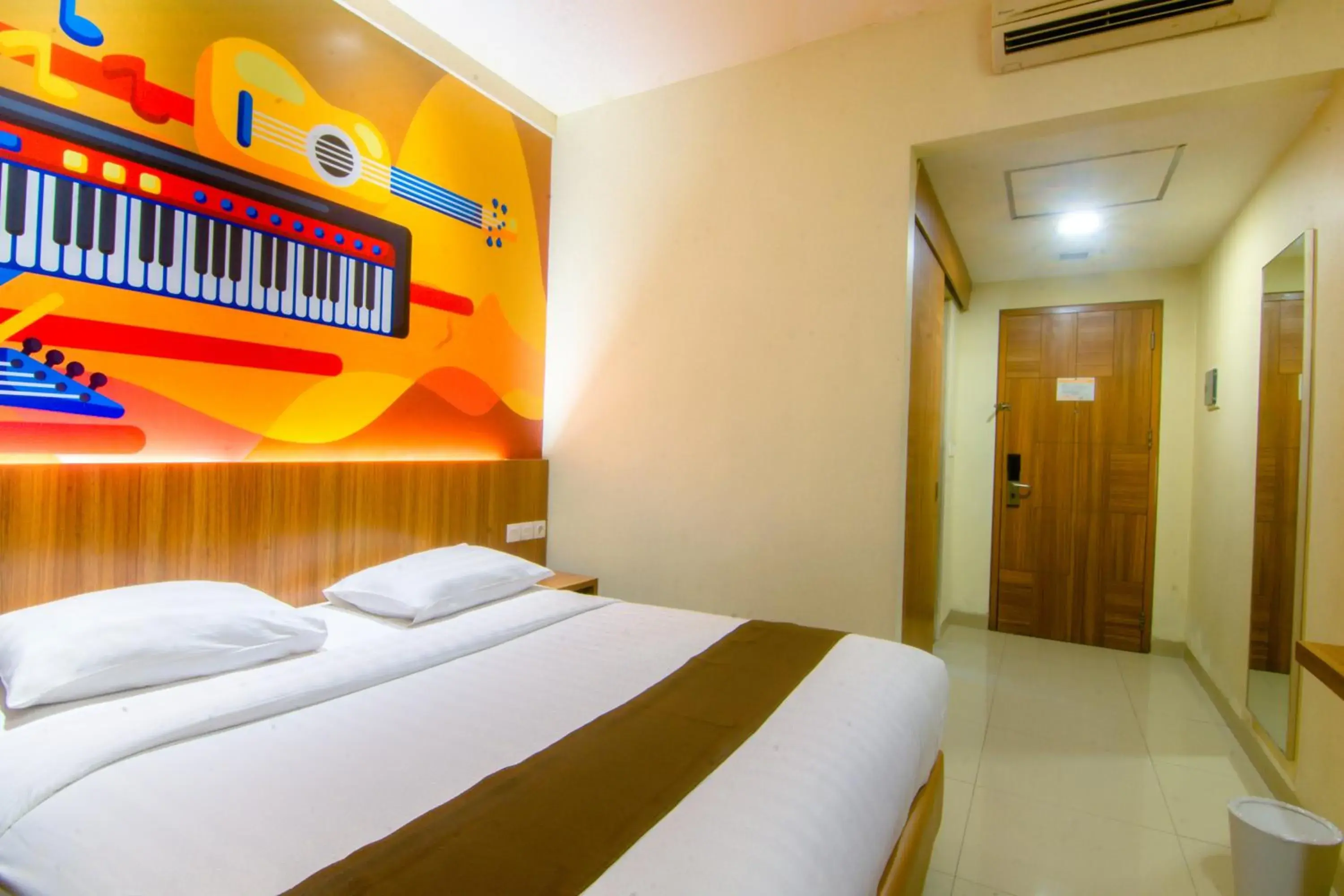 Bedroom, Bed in Front One Hotel Purwodadi