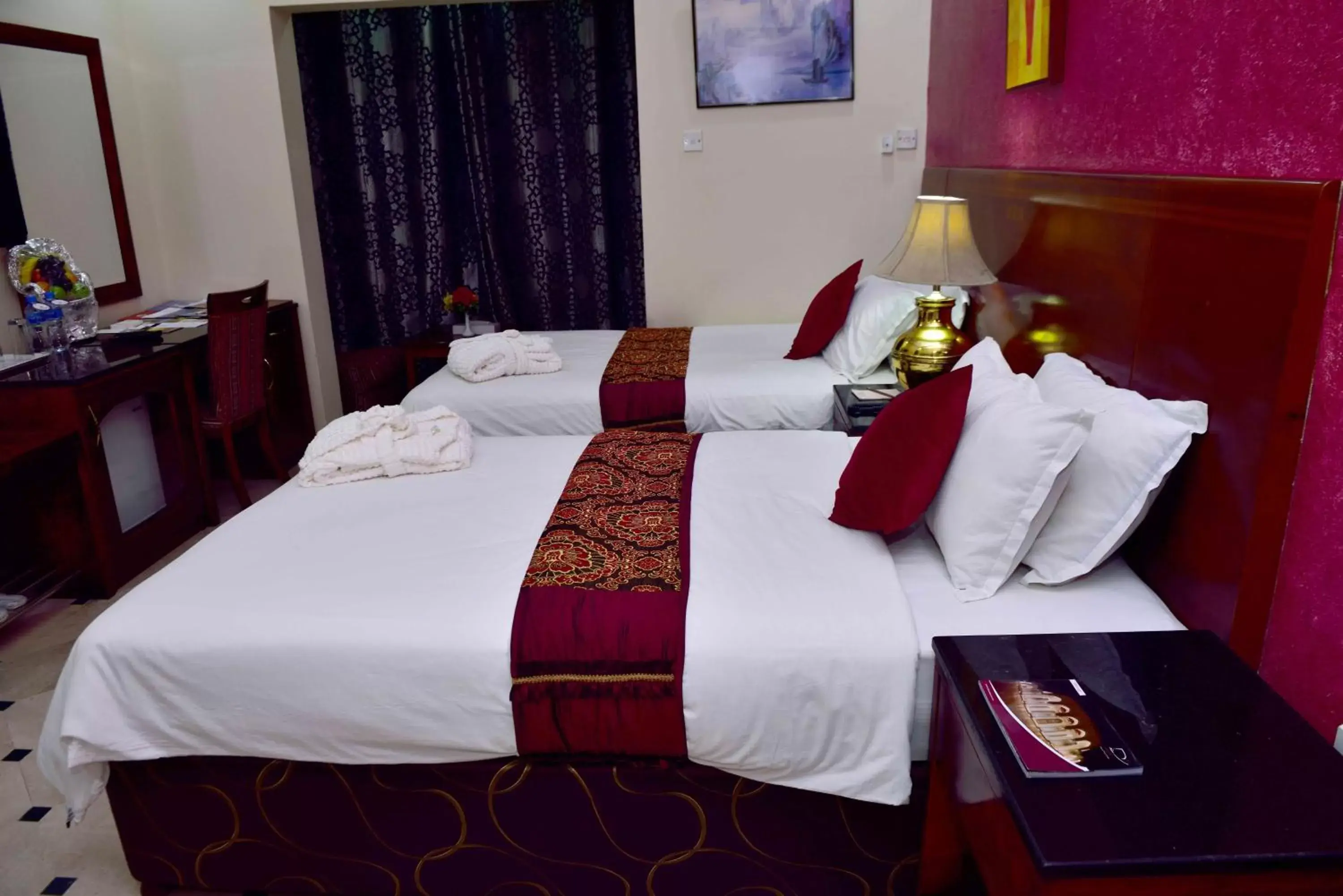 Photo of the whole room, Bed in Al Bahjah Hotel