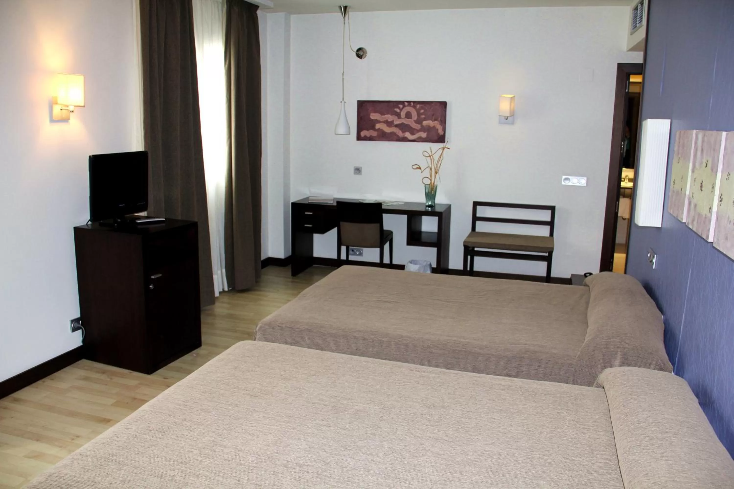 Bed in Hotel Puerta de Ocaña