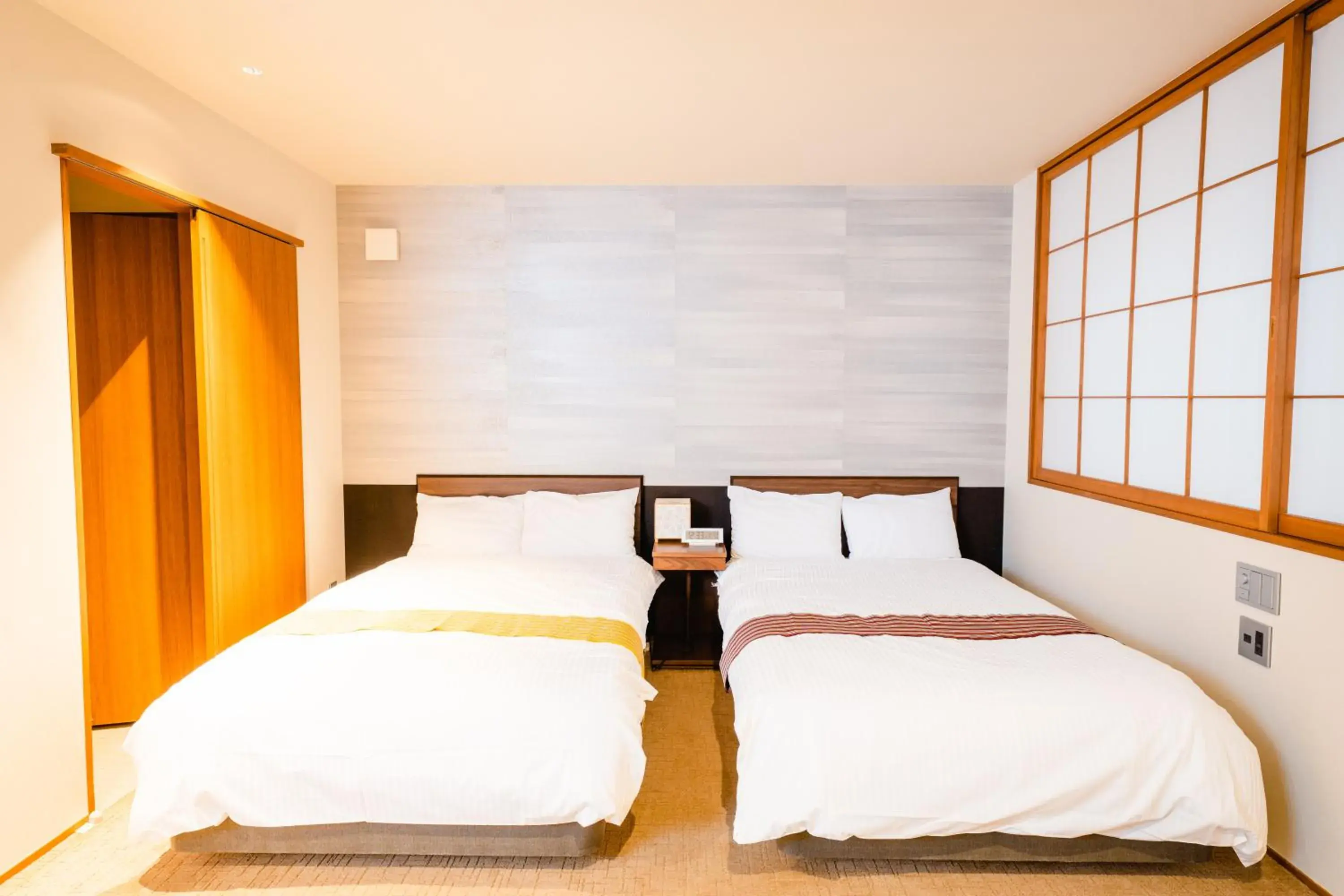 Bed in Hotel Rakurakuan