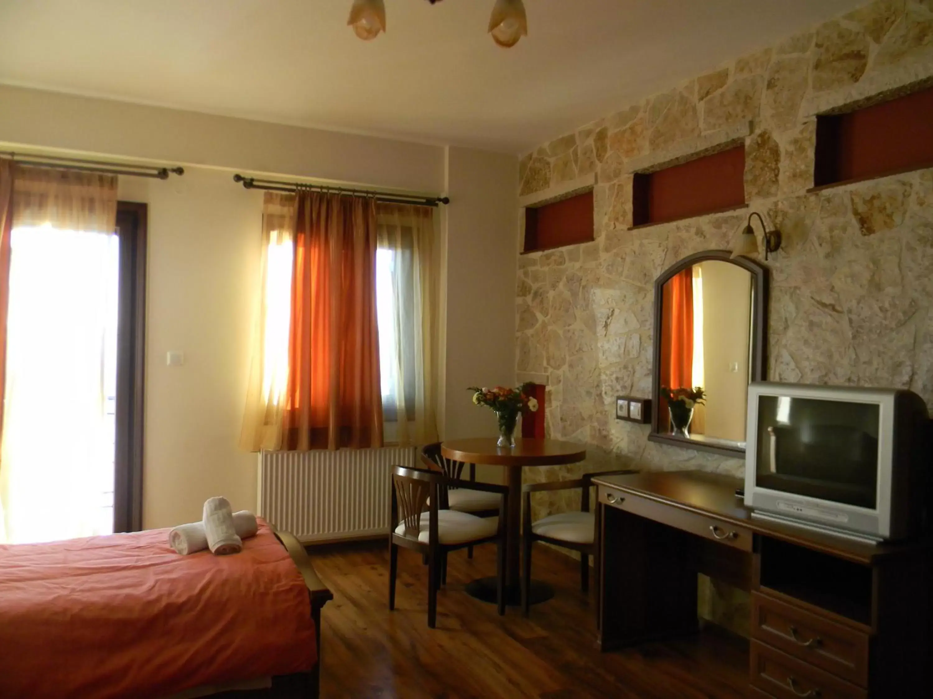 Bedroom, TV/Entertainment Center in Agnantio